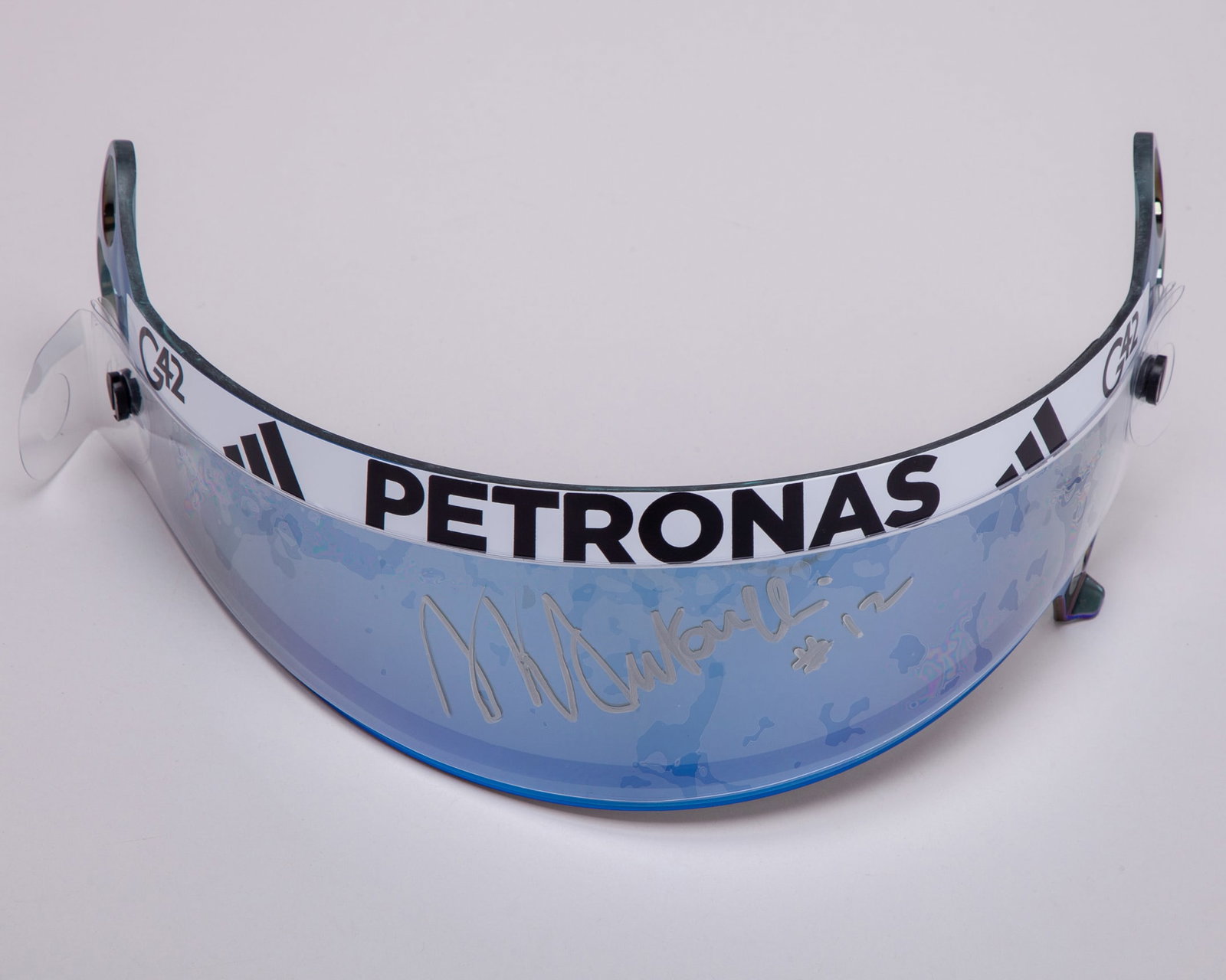 Kimi Antonelli 2025 Signed Mercedes-AMG Petronas F1 Team Used Visor: Kimi Antonelli 2025 Signed Mercedes-AMG Petronas F1 Team Used Visor.Own a rare piece of Formula 1 history with this authentic used visor worn by Kimi Antonelli?during the 2025 Formula 1 season, his de