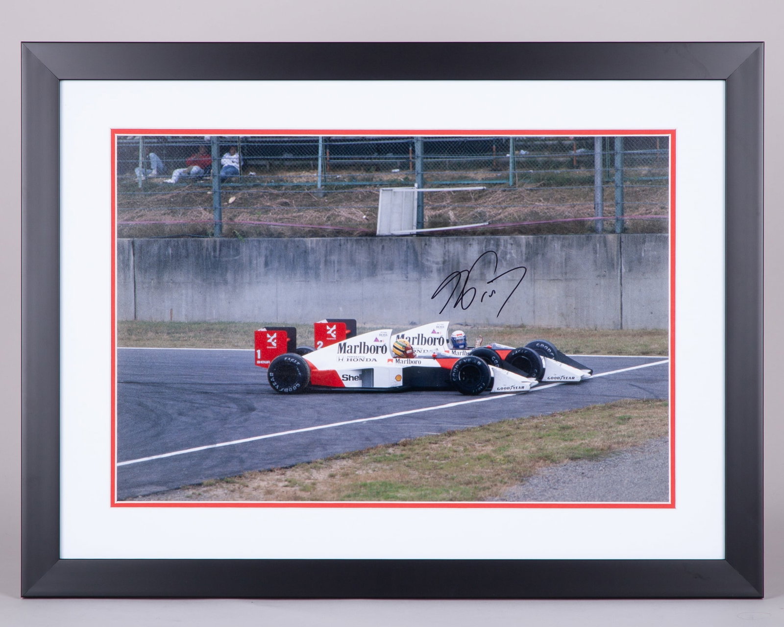Alain Prost Signed 1989 Japanese Grand Prix Framed Print - Senna and Prost's Suzuka Showdown: Alain Prost Signed 1989 Japanese Grand Prix Framed Print - Senna and Prost's Suzuka Showdown.The print captures the iconic moment at the 1989 Japanese Grand Prix, where Senna and Prost collided.The pr