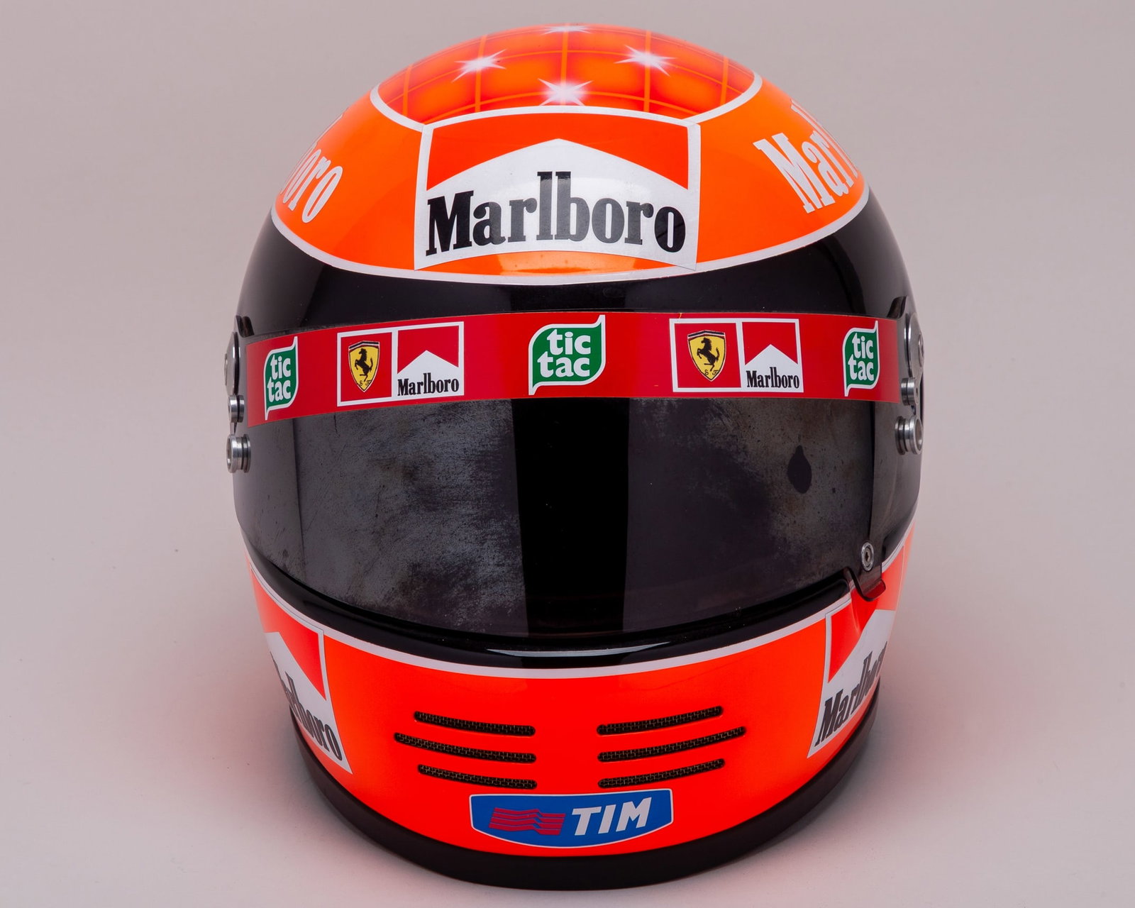 Michael Schumacher Ferrari Unofficial Replica Helmet: Michael Schumacher Ferrari Unofficial Replica Helmet.This is an unofficial?helmet representing one of the greatest drivers in motorsport history. Created by the iconic designs worn by Schumacher durin