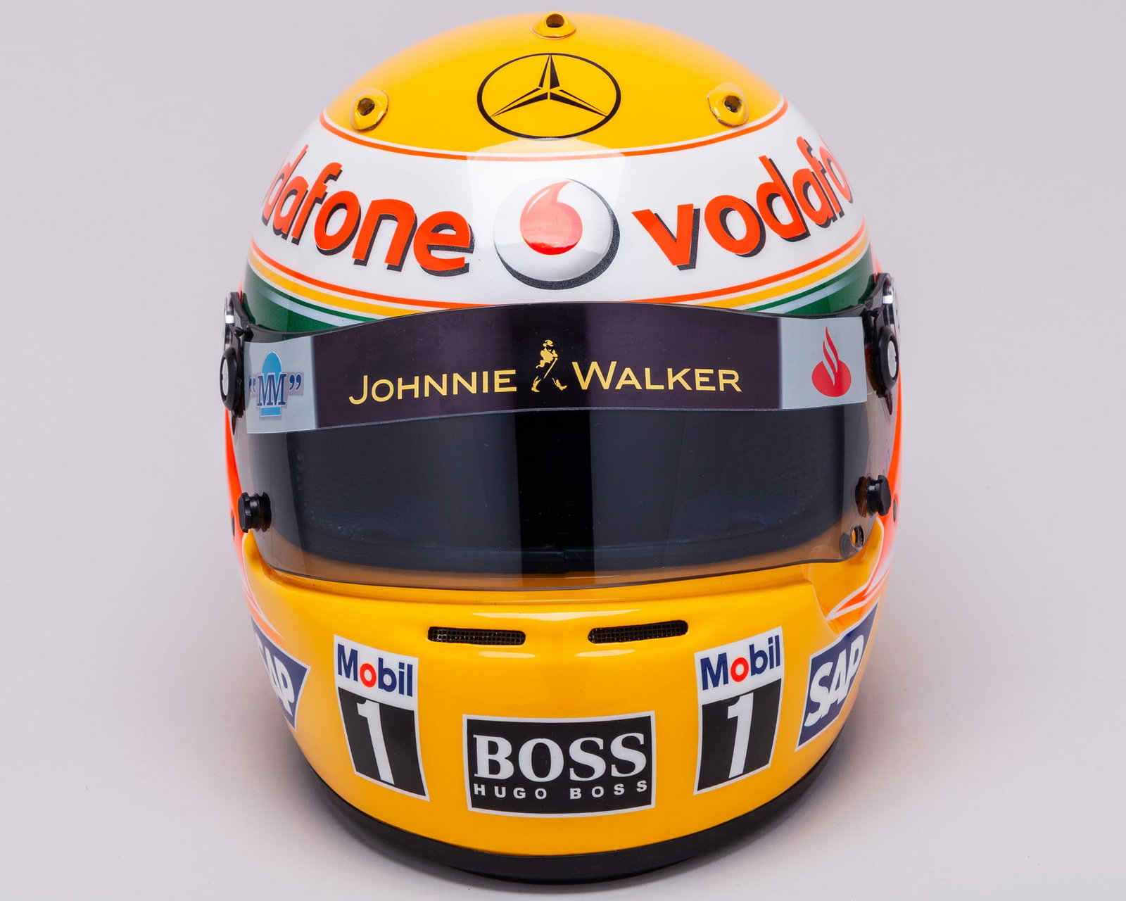 Lewis Hamilton 2007 Vodafone McLaren Mercedes Full Size Replica Helmet: Lewis Hamilton 2007 Vodafone McLaren Mercedes Full Size Replica Helmet.This is a full-size replica helmet of Lewis Hamilton?s iconic 2007 Vodafone McLaren Mercedes design, from his incredible rookie F