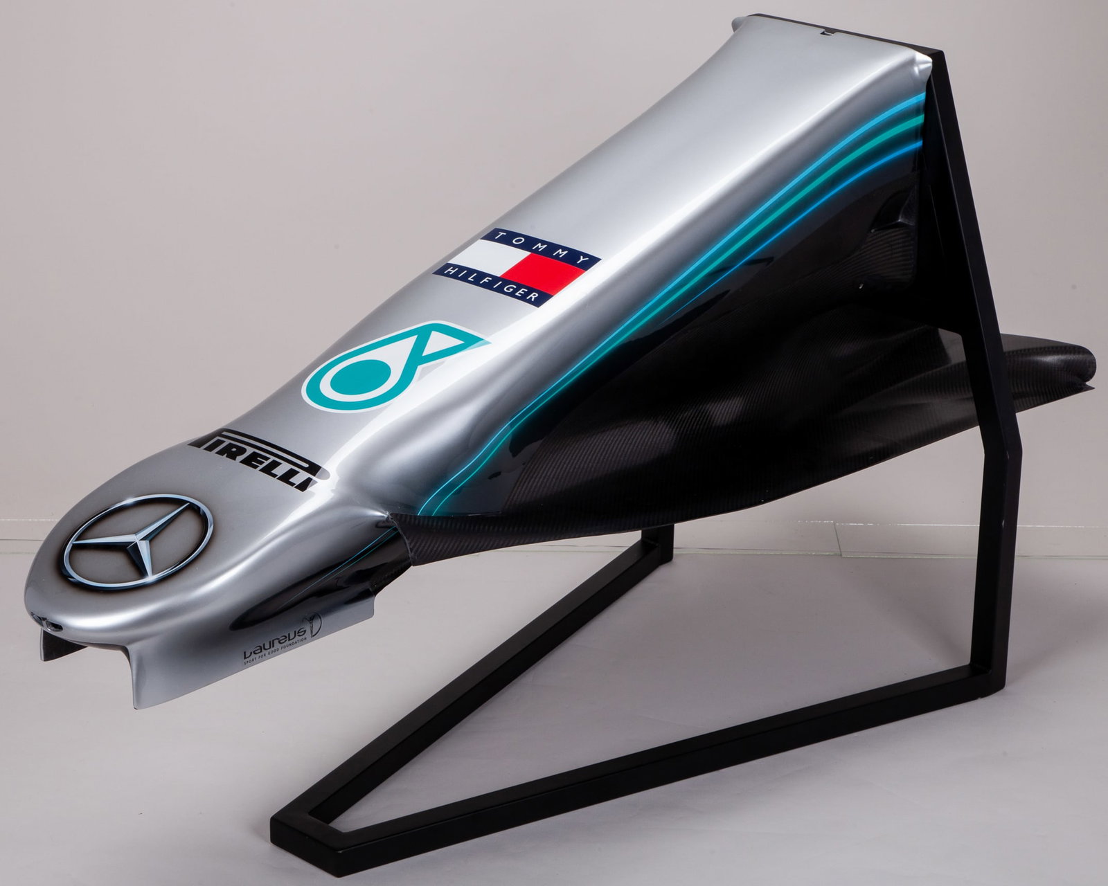 2019 Mercedes-AMG Petronas Motorsport W10 Show Car Nose Cone Display: 2019 Mercedes-AMG Petronas Motorsport W10 Show Car Nose Cone Display.This is a 2019 Mercedes-AMG Petronas Motorsport factory produced W10 show car nose cone on a custom display stand.Capturing the typ