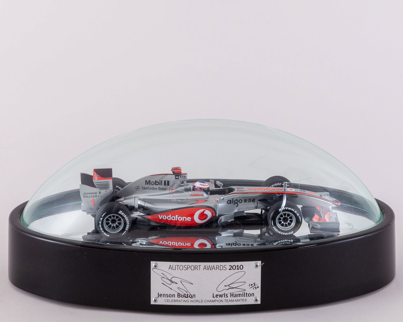 Lewis Hamilton & Jenson Button Signed 2010 Autosport Awards Limited Edition Display: Lewis Hamilton & Jenson Button Signed 2010 Autosport Awards Limited Edition Display.This display is limited edition number 105 of 130.?Plaque inscribed Celebrating World Champion Team Mates.The displa
