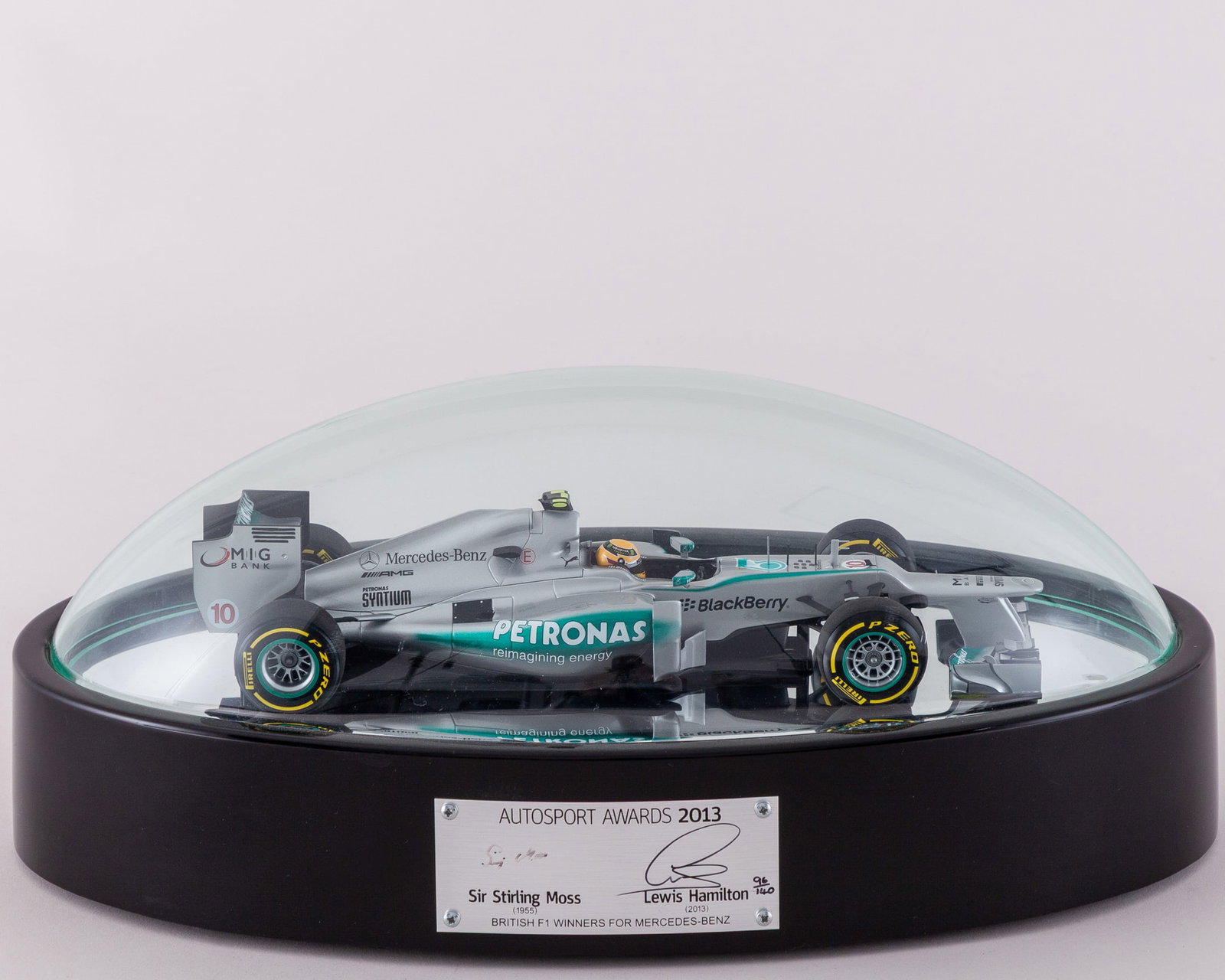 Stirling Moss & Lewis Hamilton Signed 2013 Autosport Awards Limited Edition Display: Stirling Moss & Lewis Hamilton Signed 2013 Autosport Awards Limited Edition Display.This display is limited edition number 96 of 140.Plaque inscribed British F1 Winners For Mercedes-Benz.The display m
