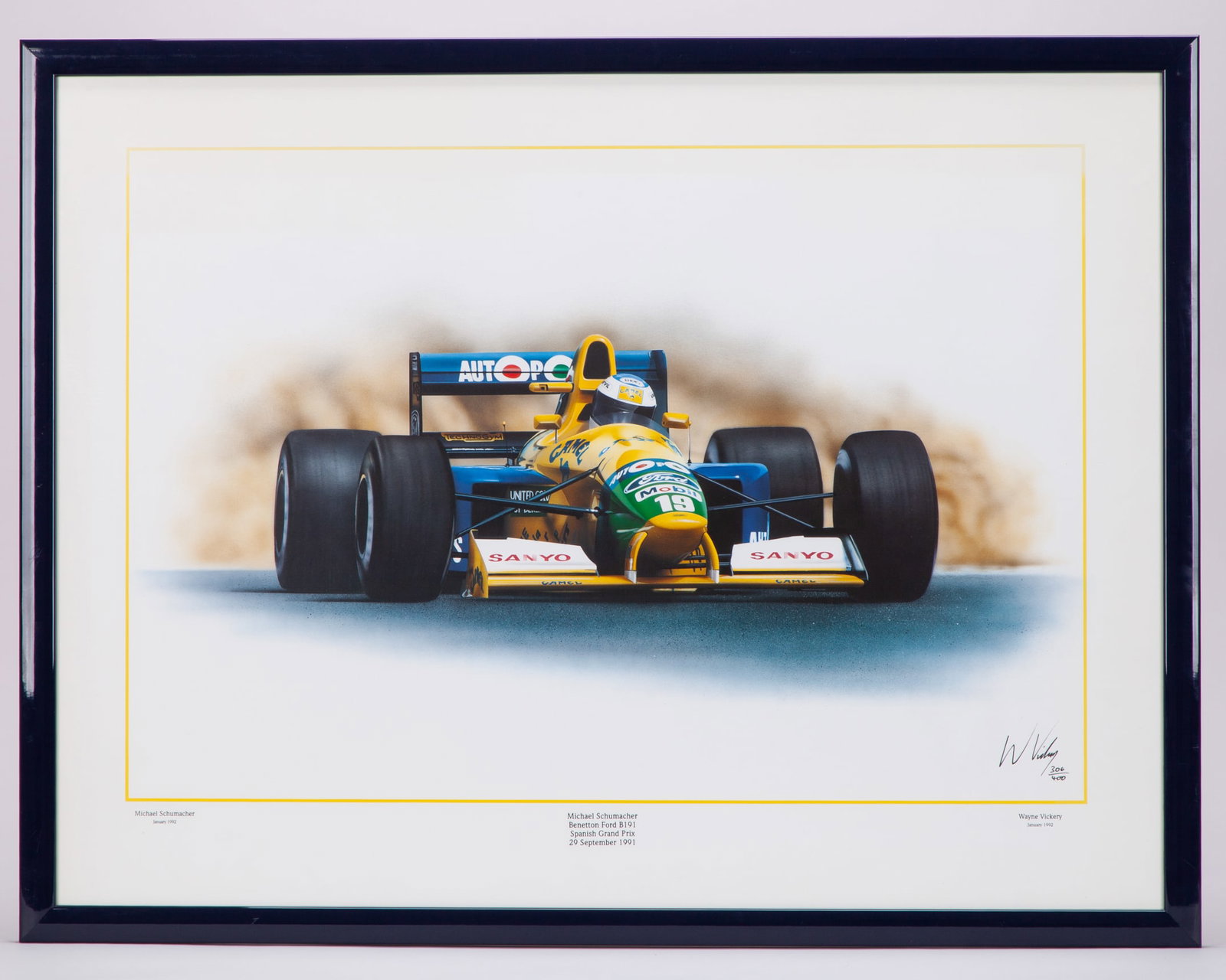 Michael Schumacher 1991 Benetton B191 Spanish Grand Prix Framed Print - by Wayne Vickery: Michael Schumacher 1991 Benetton B191 Spanish Grand Prix Framed Print - by Wayne Vickery.The print captures the 7-time F1 World Champion driving the Benetton B191 at the Spanish Grand Prix, dated 29th
