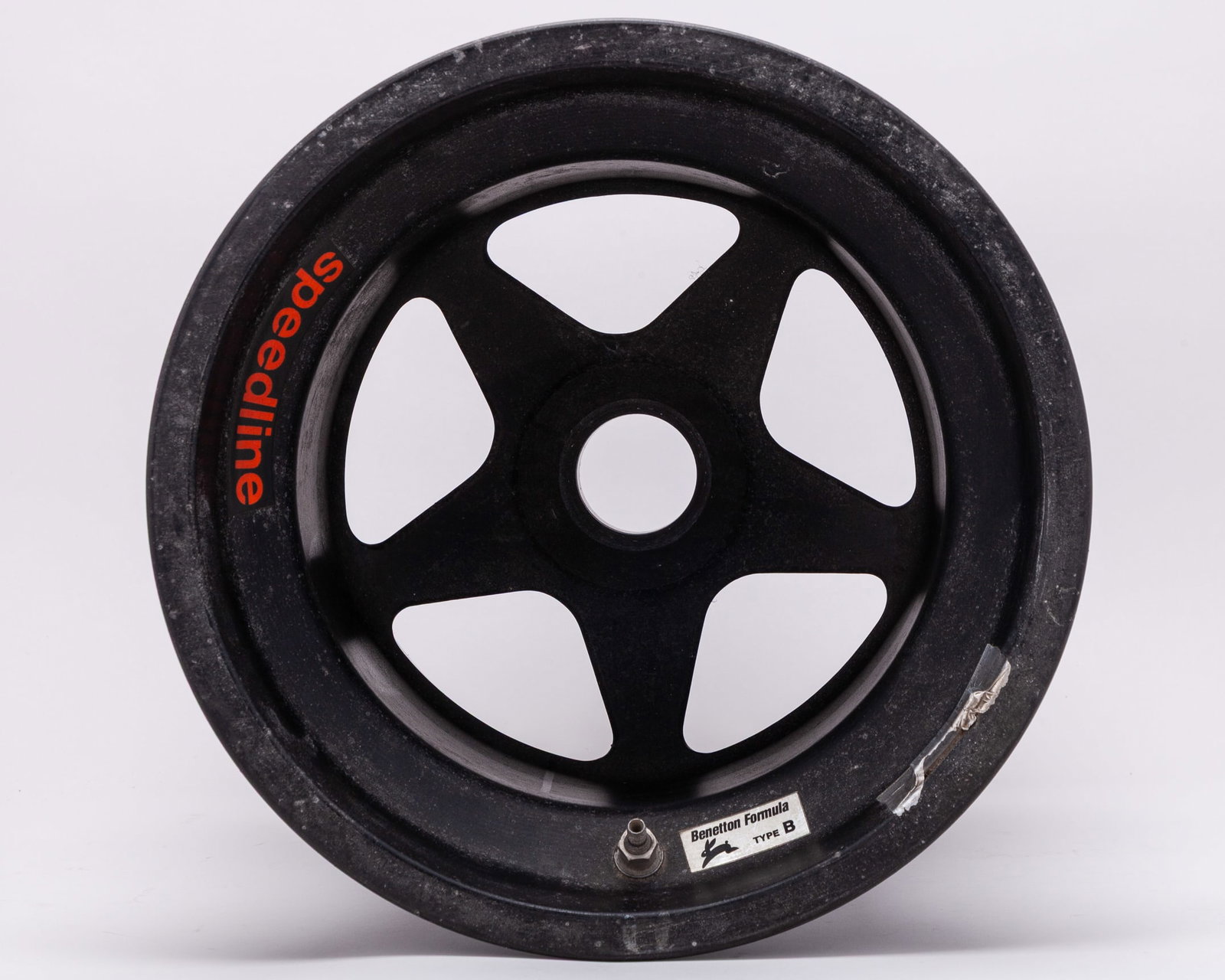 Benetton Used Rear Wheel Rim: Benetton Used Rear Wheel Rim.This is an authentic used rear wheel rim from the Benetton Formula One Team.The wheel rim is inscribed - Benetton Formula Type B.?