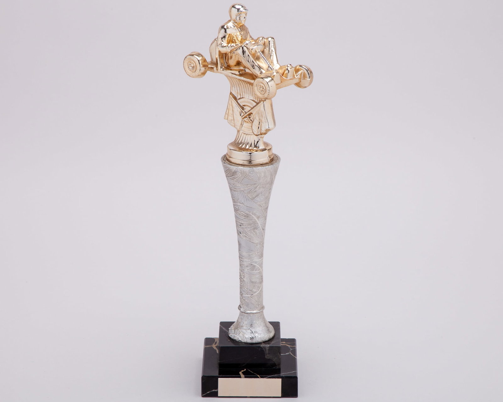 Nigel Mansell Karting Trophy: Nigel Mansell Karting Trophy.This original karting trophy was awarded?to the 1992 F1 World Champion Nigel Mansell.The trophy measures 30cm height x 8cm length x 8cm width.
