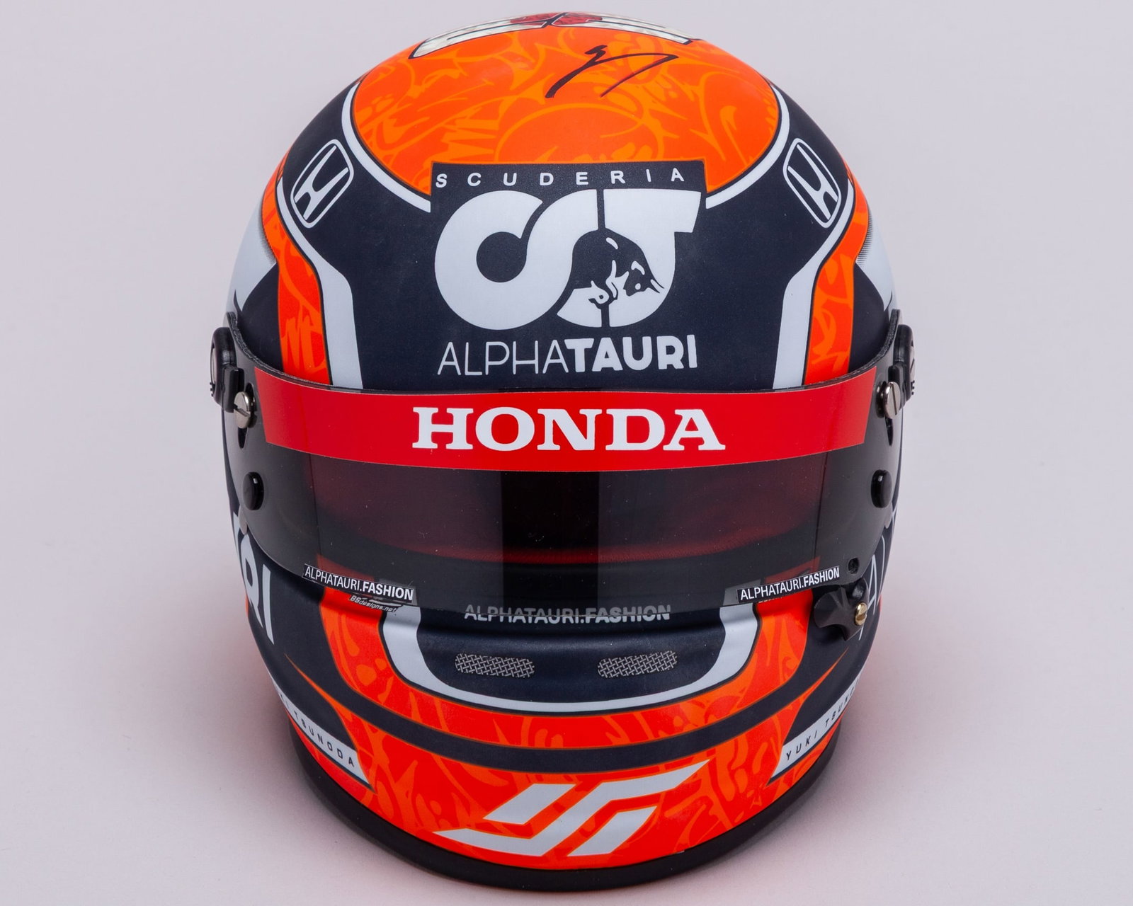 Yuki Tsonoda 2021 Signed Alpha Tauri 1:2 Scale Arai Helmet: Yuki Tsonoda 2021 Signed Alpha Tauri 1:2 Scale Arai Helmet. This 1:2 scale Arai helmet has been personally signed by Yuki Tsonoda. Complete in the original helmet box.