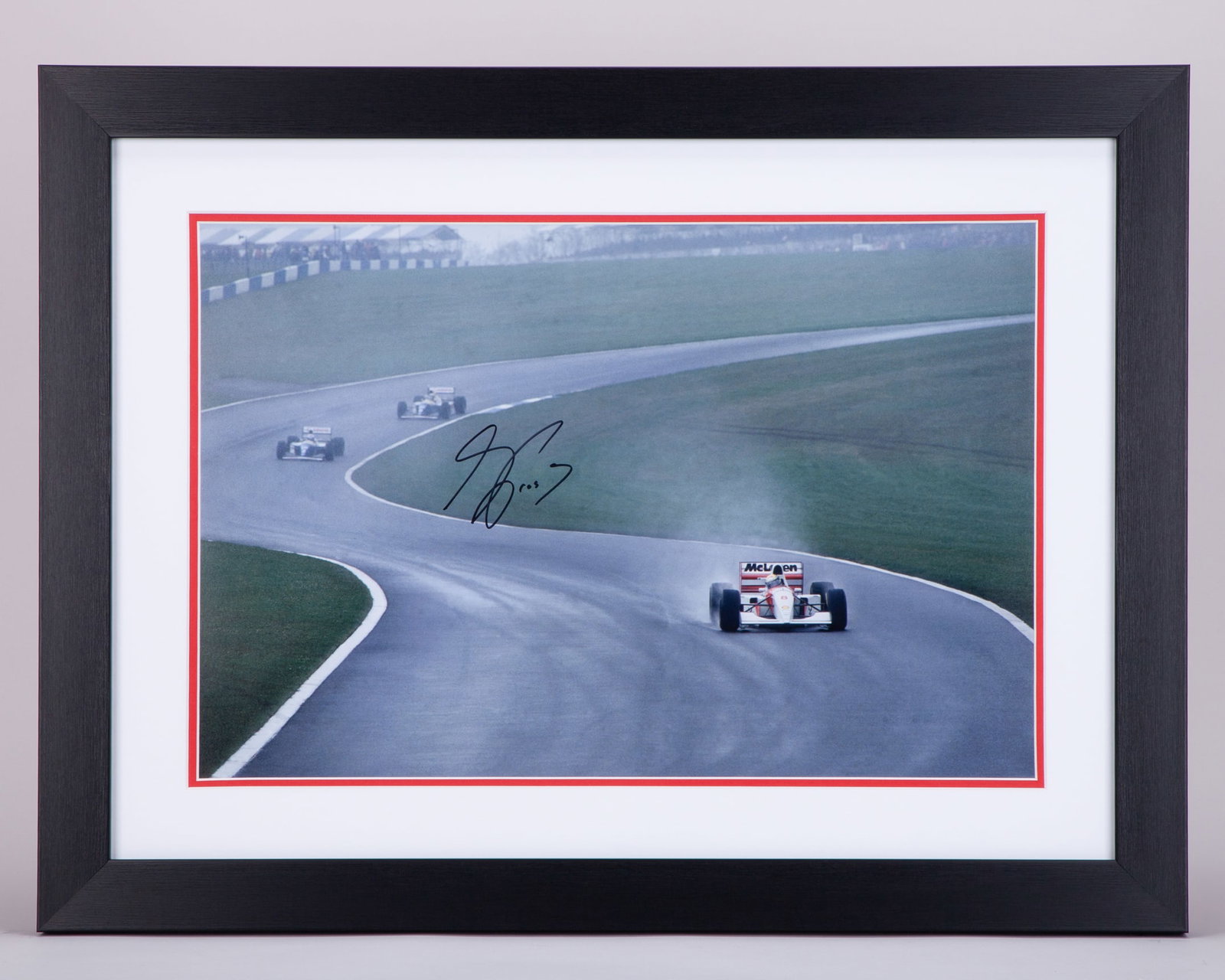 Alain Prost Signed Framed Print: Alain Prost Signed Framed Print. This print is personally signed by the 4-time F1 World Champion, Alain Prost. The print measures 61cm length x 46cm width. Depending on your location it may not be pos