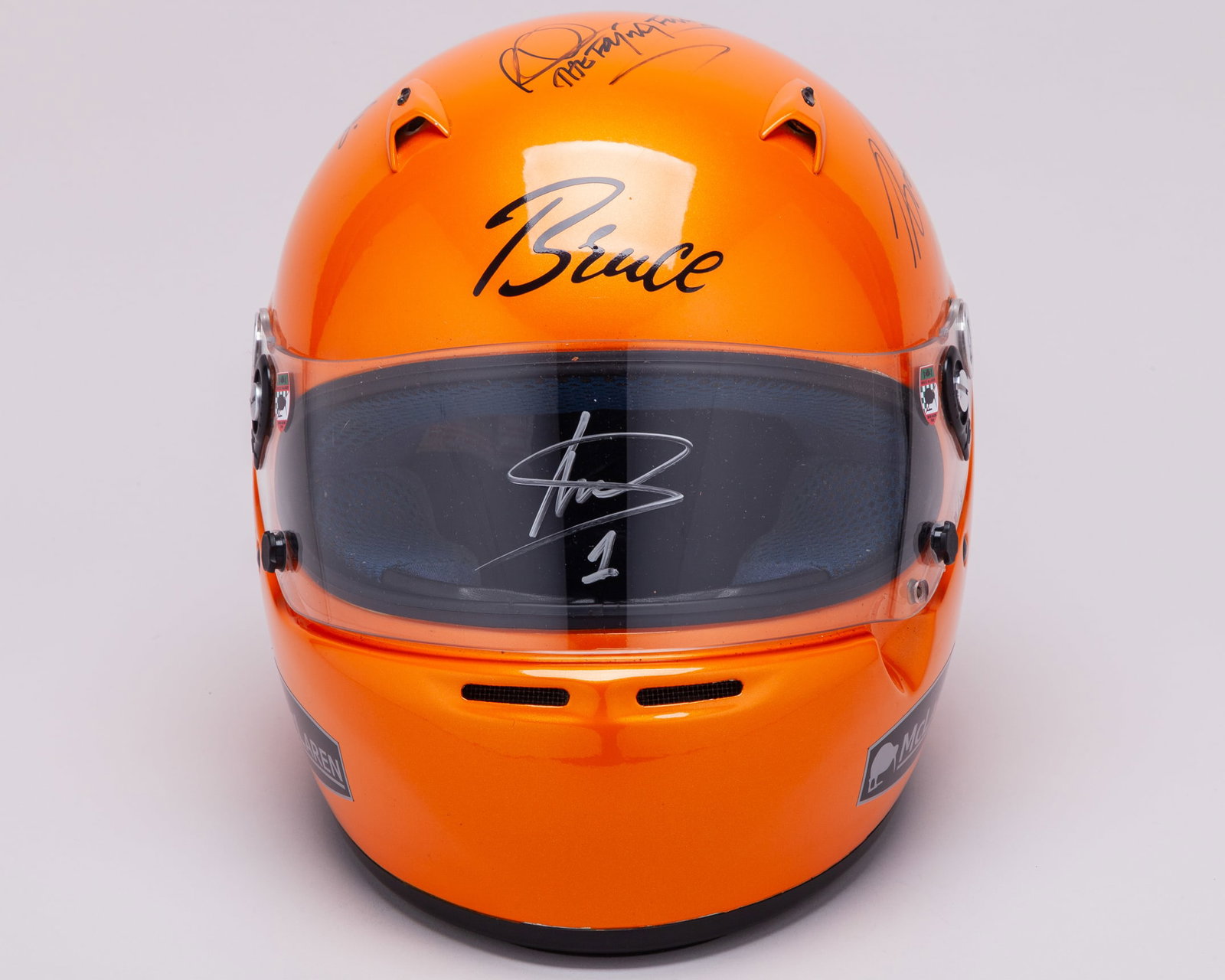 Arai Helmet Signed by Alain Prost, Mika Hakkinen, Emerson Fittipaldi & Lando Norris (1 of 10)