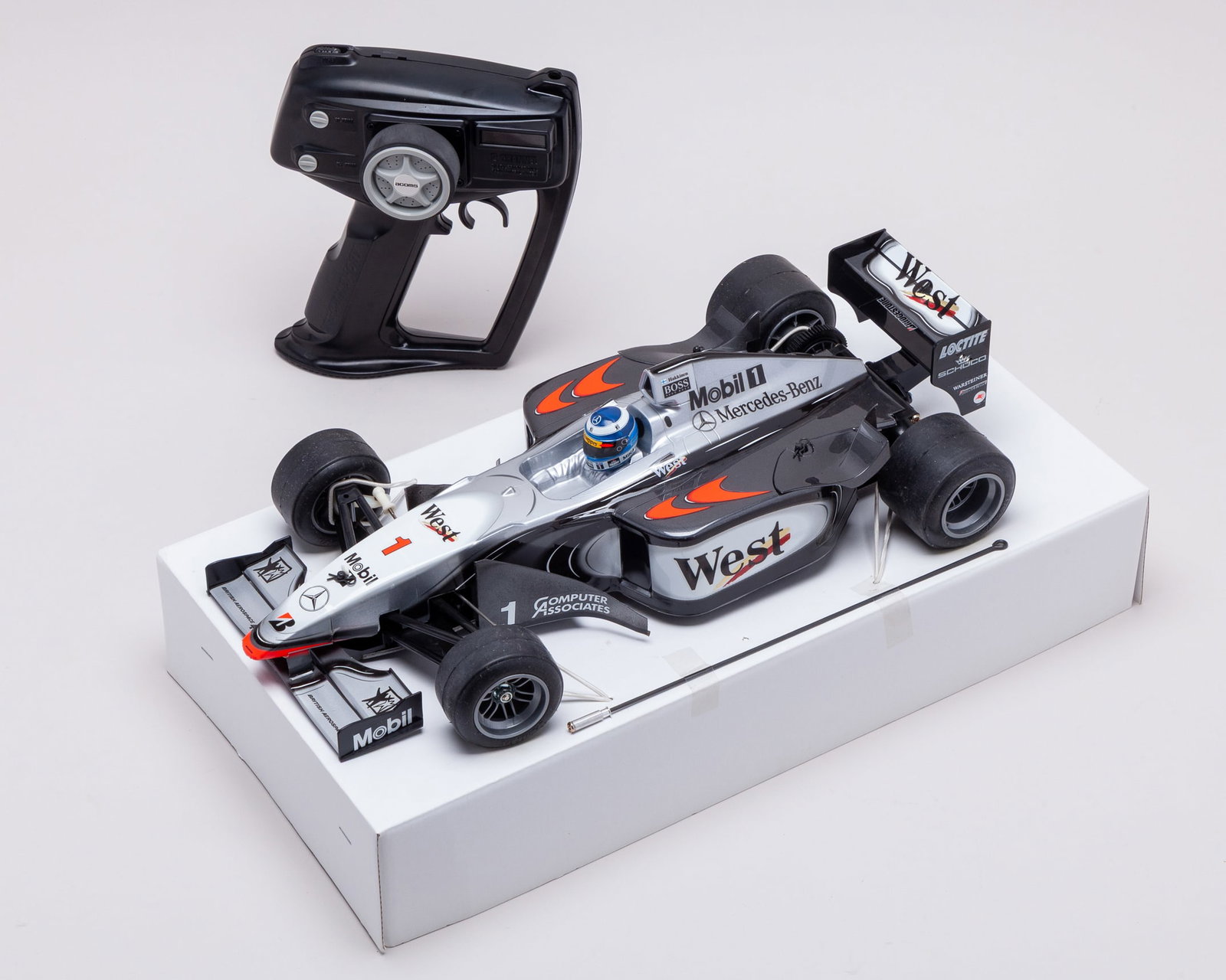 2001 Carson / Tamiya “West McLaren Mercedes” F1 Mika Häkkinen 1:10 Scale Radio Controlled: 2001 Carson / Tamiya “West McLaren Mercedes” F1 Mika Häkkinen 1:10 Scale Radio Controlled Car. An exceptional Carson / Tamiya West McLaren Mercedes Formula 1 1:10 scale radio-controlled model