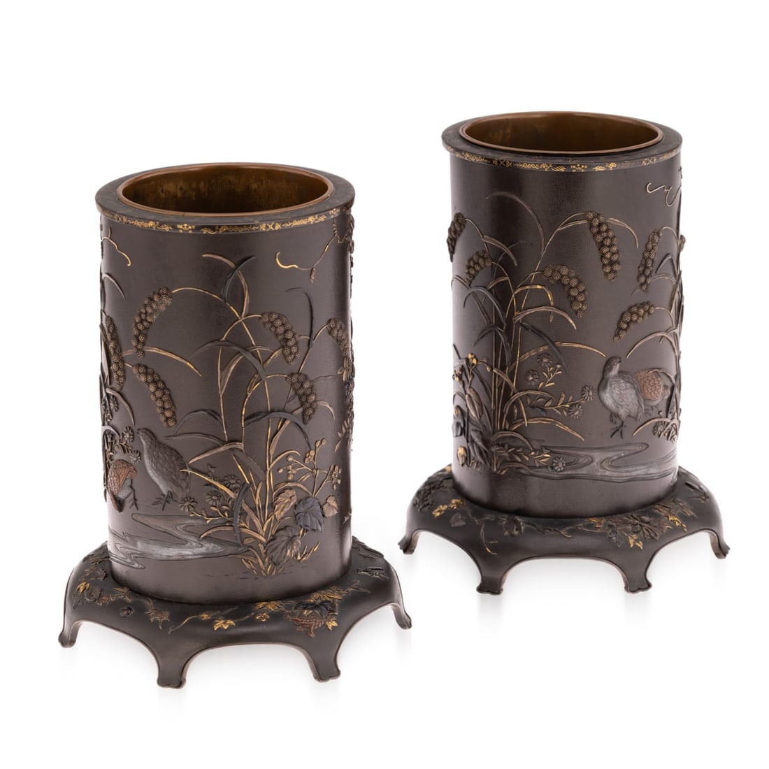 ANTIQUE 19thC JAPANESE MEIJI PERIOD PAIR OF INLAID BRONZE CYLINDRICAL BRUSHPOTS C.1890: Antique 19th Century Japanese Meiji period pair of inlaid bronze cylindrical brush pots. Each is decorated with a continuous scene in high relief of shakudō, gilt, and copper, depicting quail in