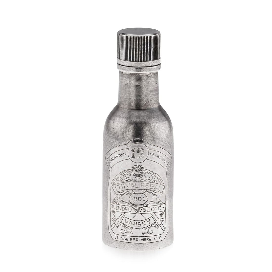 NOVELTY SOLID SILVER MINIATURE CHIVAS REGAL WHISKY BOTTLE: A novelty solid silver Chivas Regal whisky bottle. Of a miniature size however heavy gauge throughout. A cylindrical form with a matted finish throughout. Engraved with the label to represent a