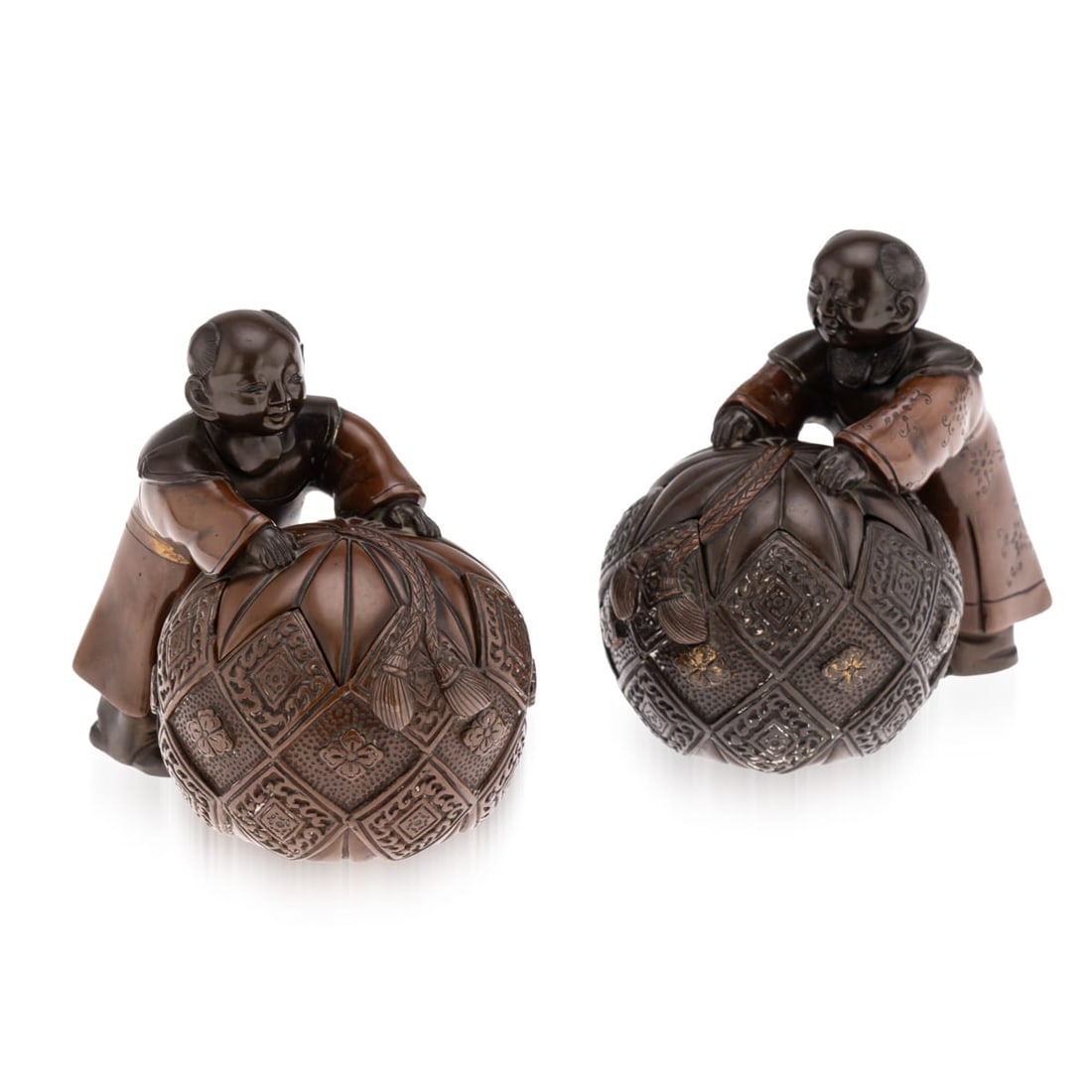 ANTIQUE 19thC JAPANESE MEIJI PERIOD PAIR OF BRONZE VESSELS IN THE FORM OF KARAKO C.1890: Antique 19th Century Japanese Meiji period pair of bronze vessels in the form of karako (Chinese boys). Each figure is cast standing and leaning forward with their hands resting on an elaborately tass