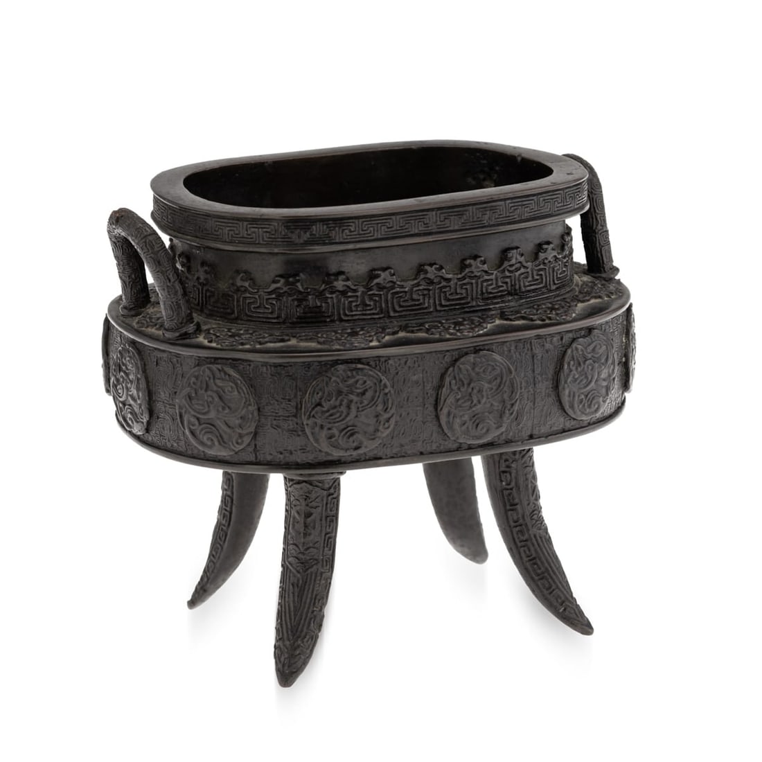 ANTIQUE 19thC JAPANESE BRONZE VESSEL IN THE STYLE OF THE 17thC EDO PERIOD: Antique 19th Century Japanese bronze vessel, Edo period. The vessel is raised on four tall feet and similarly cast with roundels enclosing stylised birds and other mythological creatures against an
