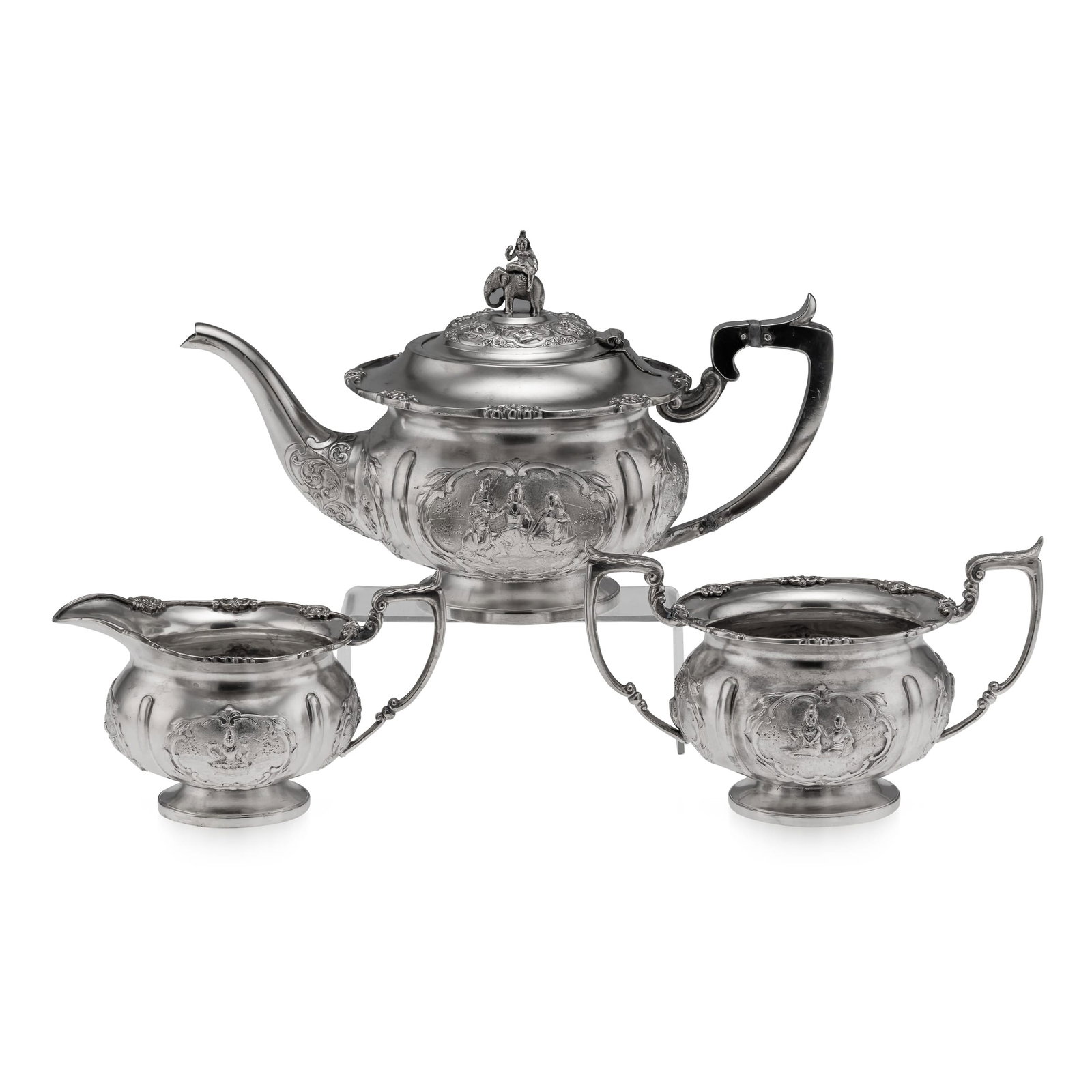 ANTIQUE 19thC INDIAN SOLID SILVER THREE PIECE TEA SET, BANGALORE c.1890: Antique 19th Century Indian three piece tea set, comprising a teapot, milk jug and sugar bowl. Each piece stands on a circular pedestal foot and has a rounded, slightly lobed body. The surfaces are