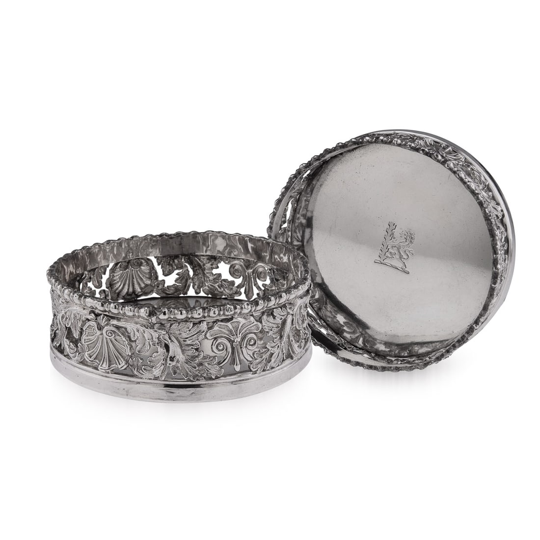ANTIQUE 19thC GEORGIAN SOLID SILVER PAIR OF WINE COASTERS, SHEFFIELD c.1810: 19th Century pair of Georgian silver large wine bottle coasters, circular form, with shell, scroll and rocaille boarders, pierced scrollwork sides and silver interiors engraved with elaborate