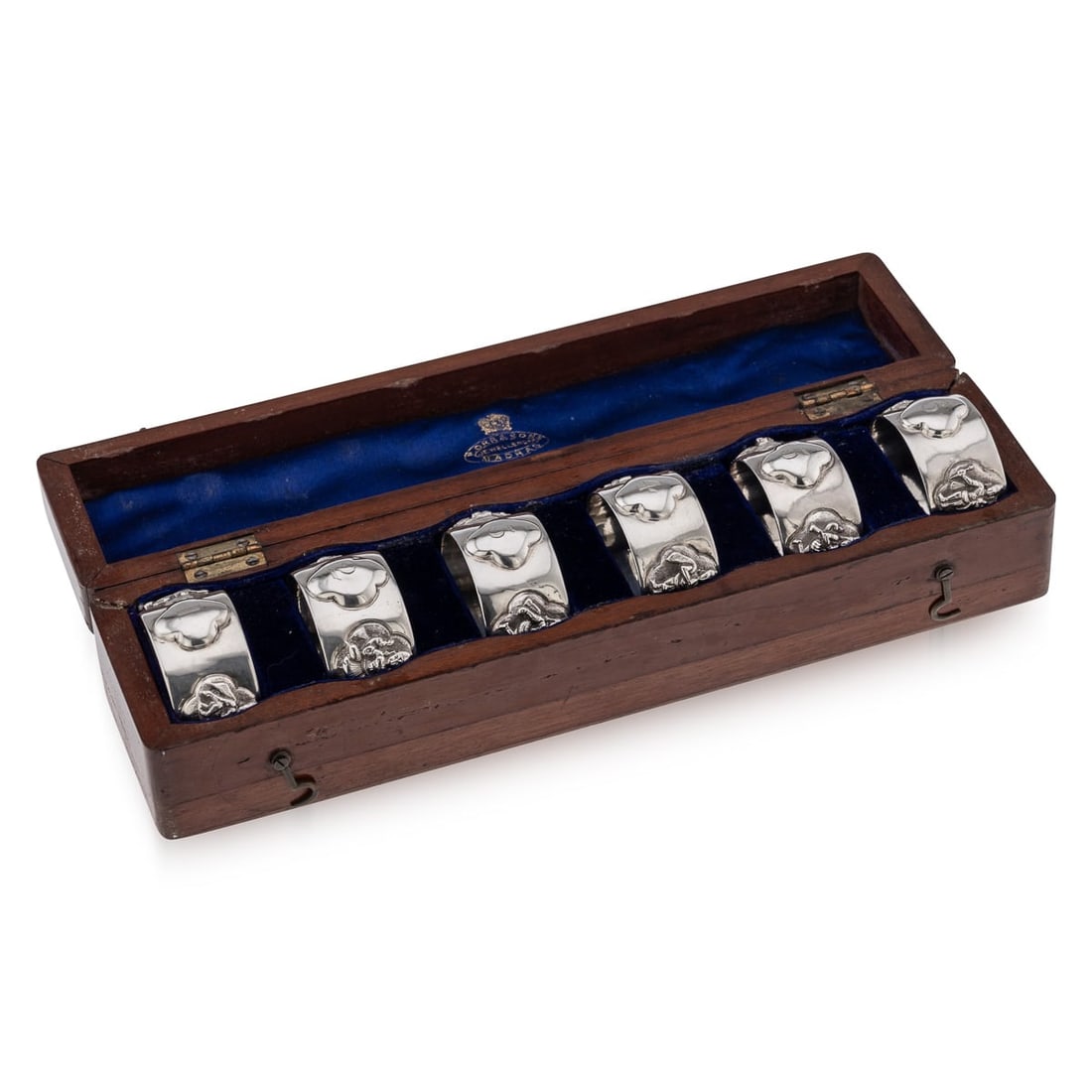 ANTIQUE 19thC INDIAN SOLID SILVER CASED SET OF SIX NAPKIN RINGS, P ORR & SONS: Antique 19th Century Indian set of six napkin rings by P Orr & Sons . Each are beautifully created with a selection of different applied castings of deities. Each ring is numbered and the set