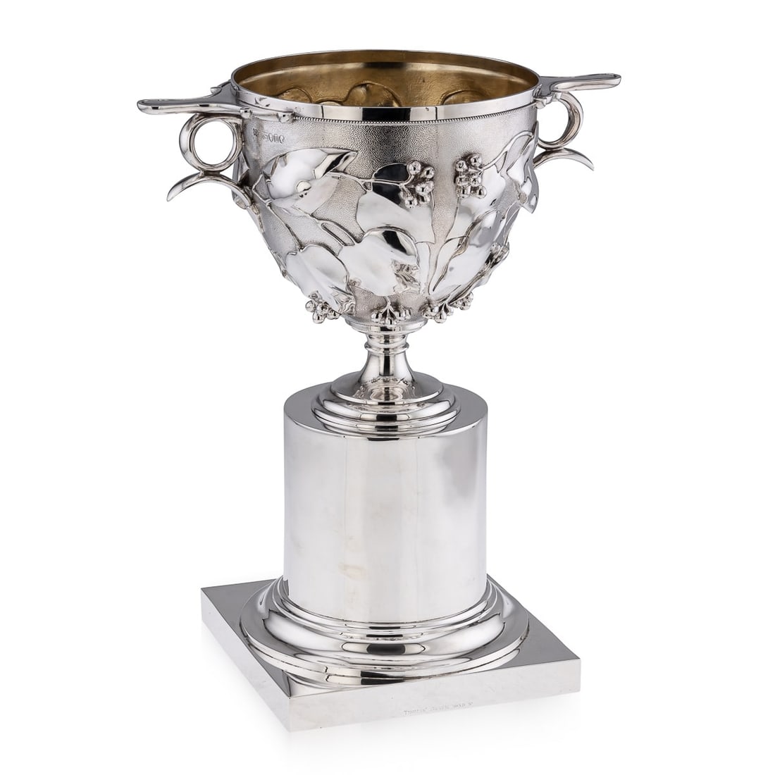 ANTIQUE 19thC VICTORIAN SOLID SILVER SKYPHOS CUP, EDWARD & JOHN BARNARD c.1867: Antique 19th Century Victorian solid silver skyphos cup, of traditional form on a plane columb base, of heavy gauge and the body chased with holly leaves and berries on matted ground, flat handles
