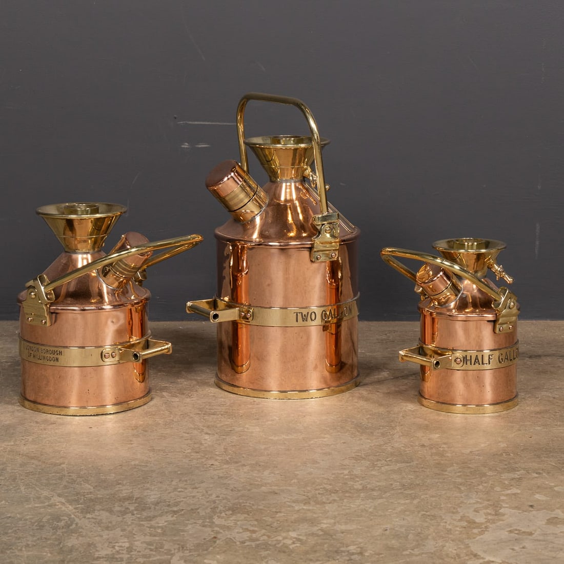 VINTAGE 20thC ENGLISH SET OF THREE POLISHED CHECKPUMP PETROL CANISTERS c.1965 - 3
