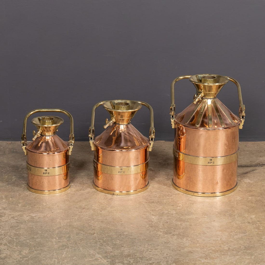 VINTAGE 20thC ENGLISH SET OF THREE POLISHED CHECKPUMP PETROL CANISTERS c.1965 - 5