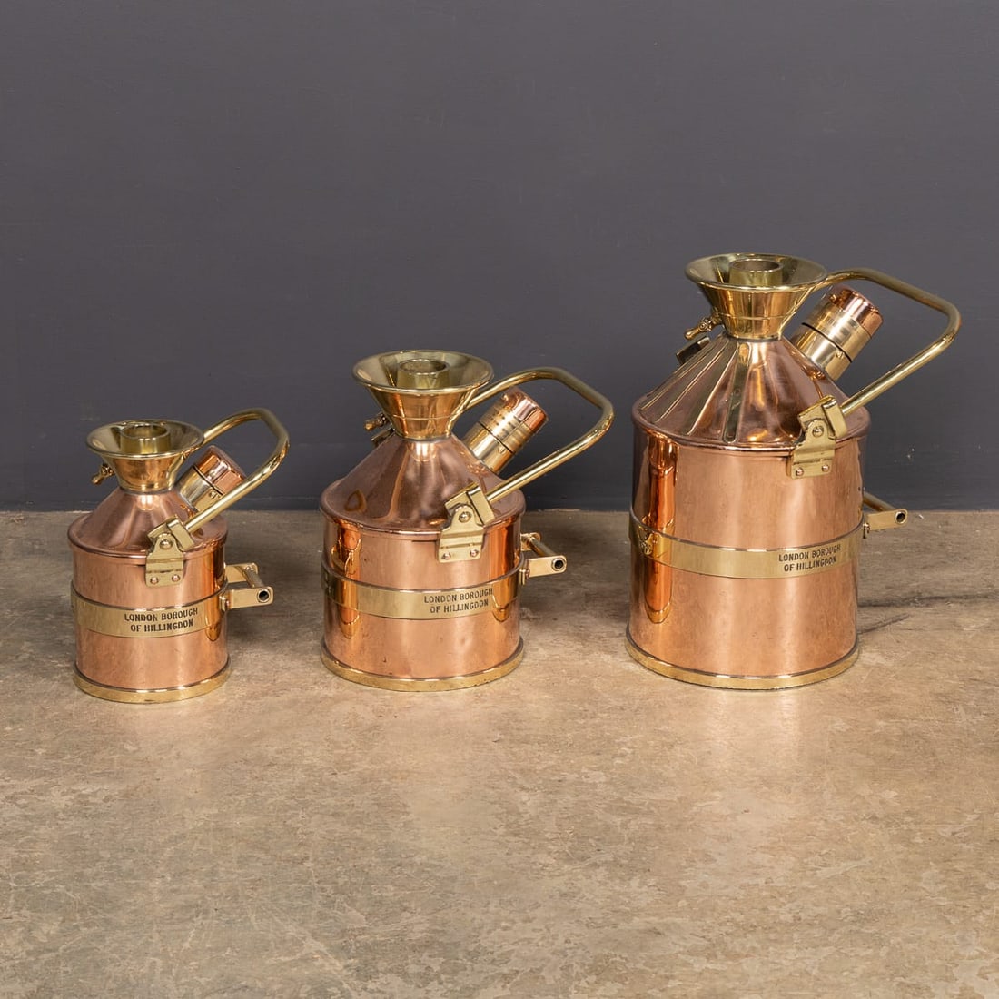 VINTAGE 20thC ENGLISH SET OF THREE POLISHED CHECKPUMP PETROL CANISTERS c.1965 - 6