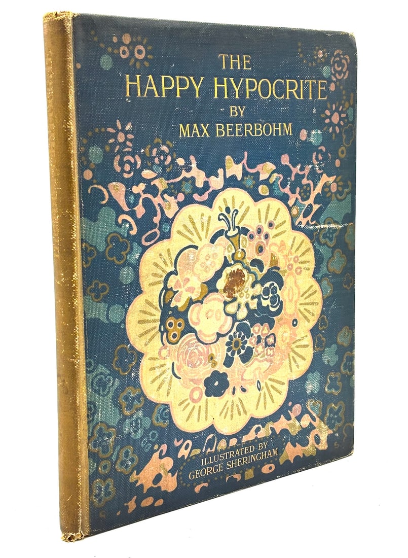 Max Beerbohm: The Happy Hypocrite (1915) illustrated by George Sheringham: London: John Lane; The Bodley Head, (1915). First edition with these illustrations. Small quarto, pictorial cloth, good to very good, rubbing and light wear to edges of covers and spine ends, light so