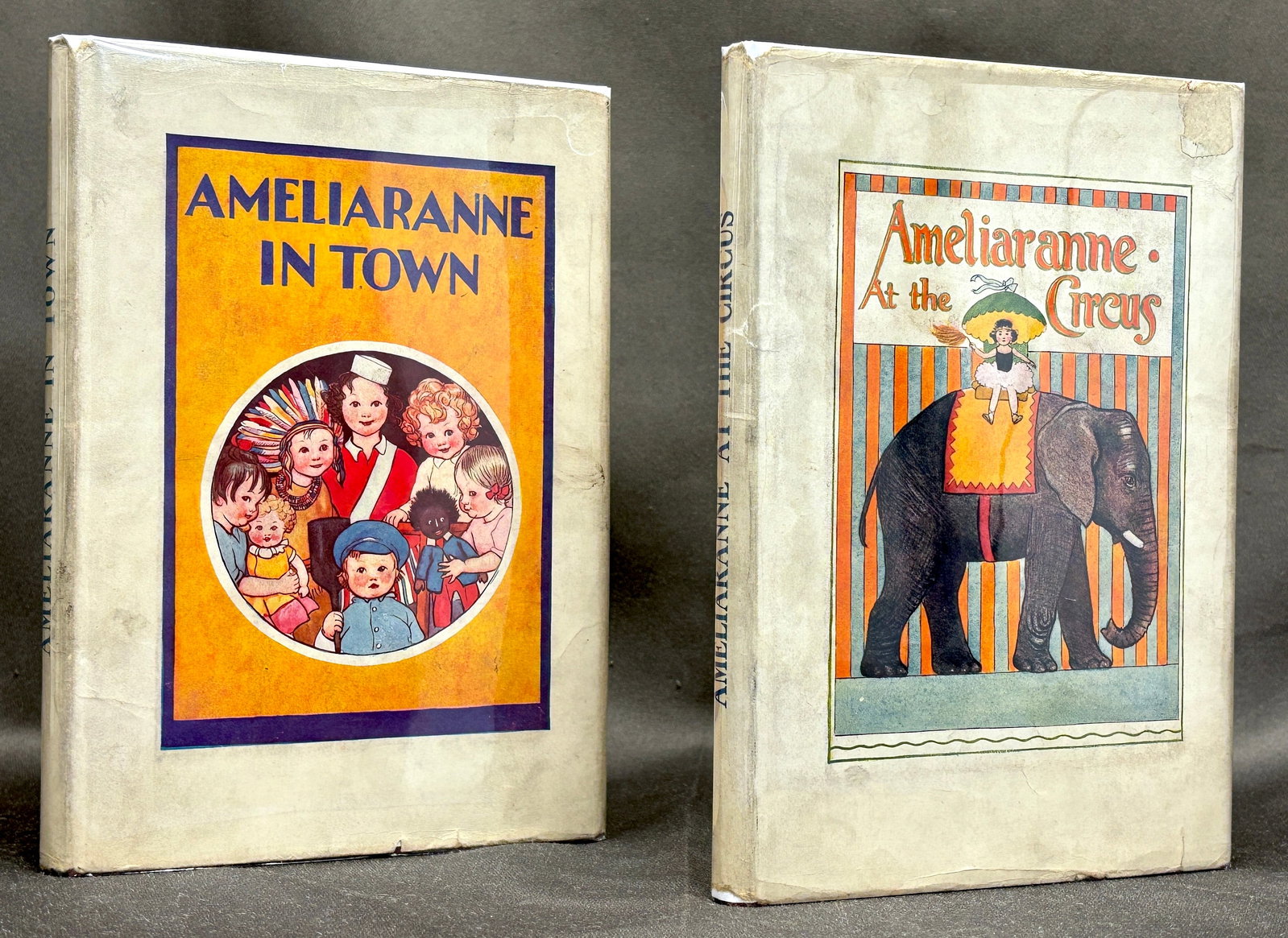 Natalie Joan & Susan Beatrice Pearse: Ameliaranne in Town [&] At the Circus, 1930-1931: Philadelphia: David McKay, 1930 & 1931. First American editions. 8vo, 8 x 5.75 inches, each in dark red cloth with pictorial onlay to front covers, in pictorial dust jackets. Books are very good, prev