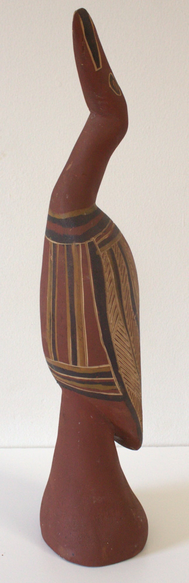 Aboriginal Palm Carving of a Brolga with traditional painted design: . Size Stands 44cms Medium Ethnographic & Indigenous Artifacts