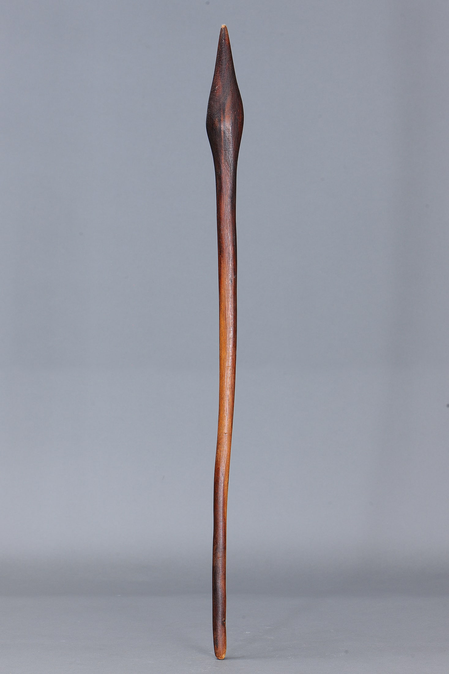 BULBOUS HEAD CLUB, SOUTH EAST AUSTRALIA: Bulbous Head Club, South East Australia. Carved and engraved hardwood. Size Approx L88cm. Medium Indigenous Artifacts Provenance Private Collection, Queensland