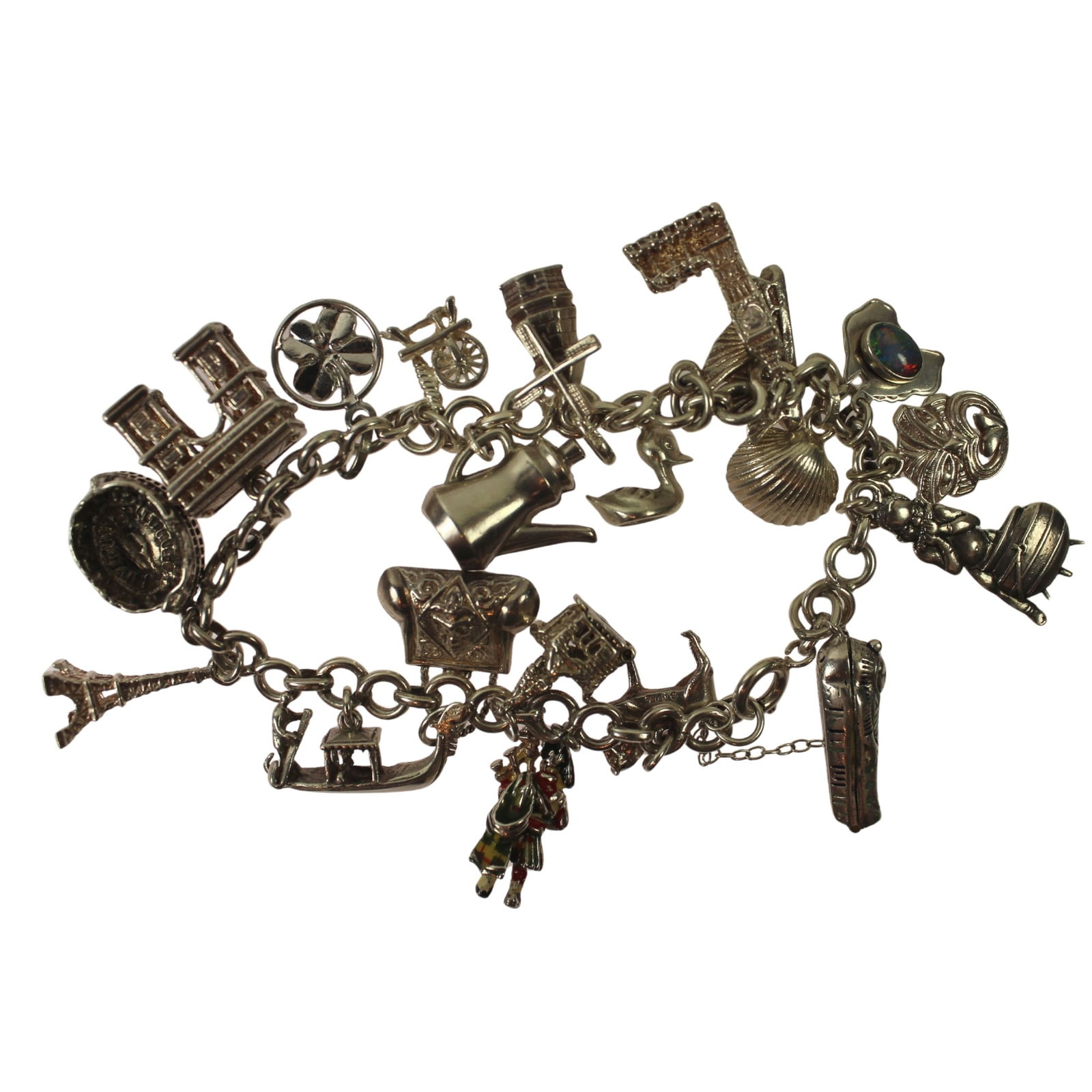 Charm Bracelet in Sterling (925) Silver: 19 Charms mostly Landmark & Travel related Size Open length 18cms : Weight 50.97gms Medium Bracelet