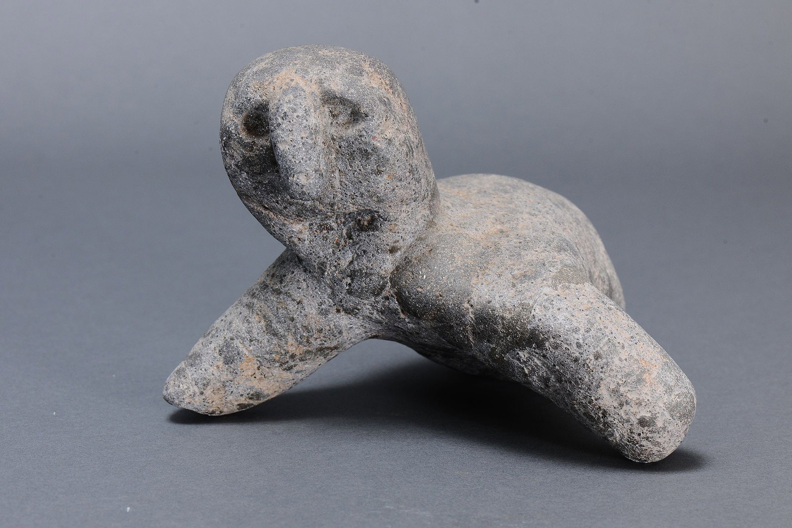 RARE EARLY ANTHROPOMORPHIC STONE FIGURE, HIGHLANDS, MOUNT HAGEN REGION, PAPUA NEW GUINEA: Rare early Anthropomorphic Stone Figure, Highlands, Mount. Hagen Region, Papua New Guinea. Carved and engraved stone. Stone figures such as these were unearthed in gardens, the story of their makers