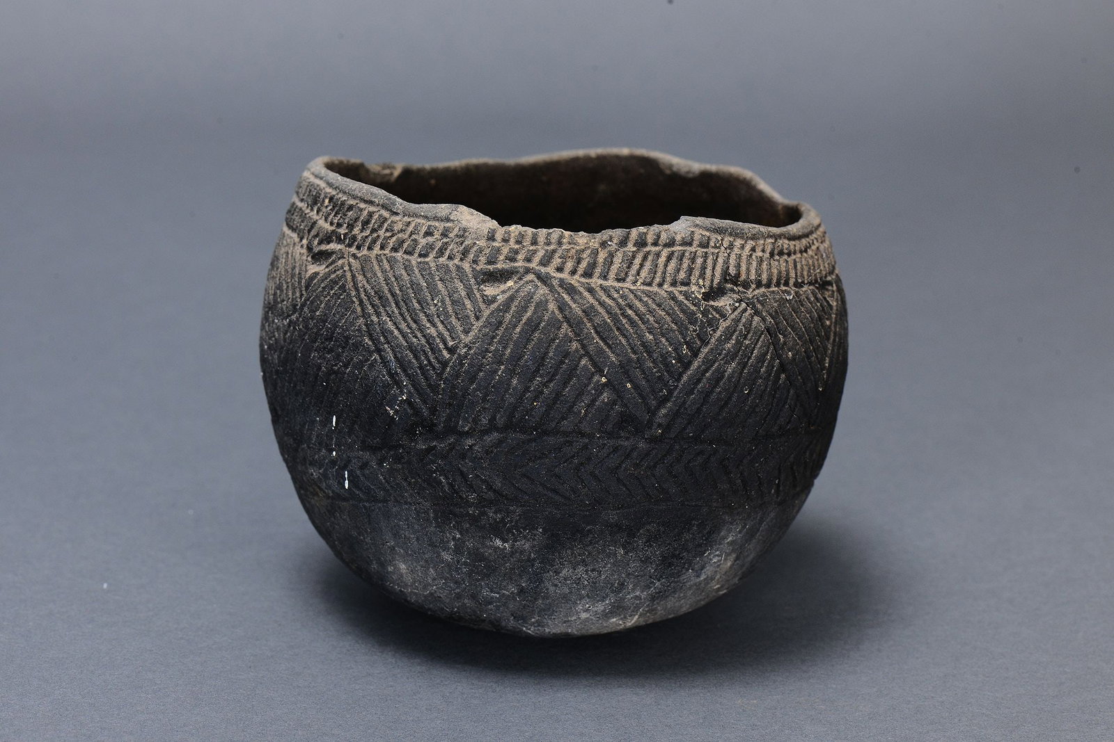 FINE EARLY POTTERY VESSEL, MADANG PROVINCE, EASTERN HIGHLANDS, PAPUA NEW GUINEA: Fine early Pottery Vessel, Madang Province, Eastern Highlands, Papua New Guinea. Sculpted fired clay and natural earth pigments.SizeApprox L16 x 12cm.MediumEthnographic & Indigenous