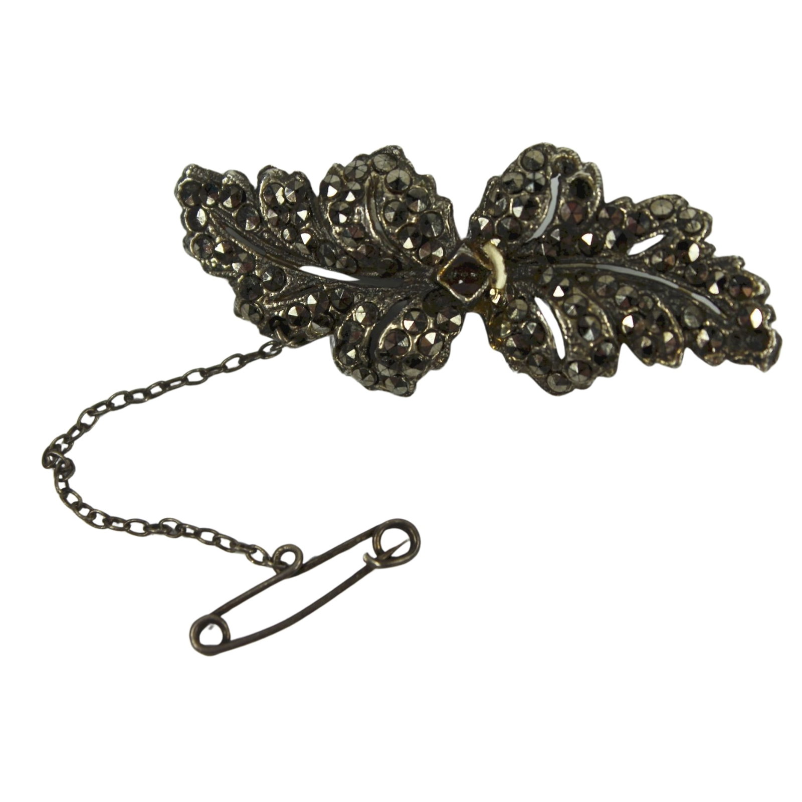 Vintage Marcasite Brooch in Sterling (925) Silver: Ex Dealer's Stock Size Length: 5cms : Total weight 11.32gms Condition Missing 3 stones Medium Pins & Brooches Exhibited Gemstones