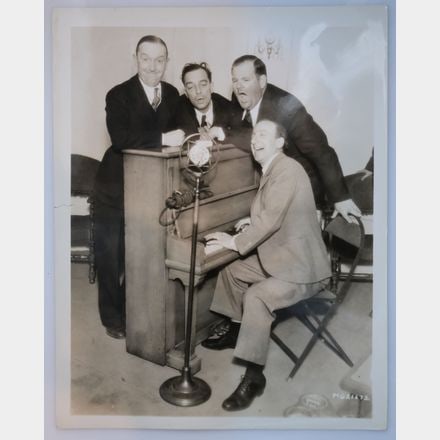 Laurel & Hardy, Buster Keaton & Jimmy Durant Original Studio Photo, Extremely Fine details: Shot on the set of MGM's 'Speak Easily' Size 26x20cms Condition 1.5cm tear on the left border Medium Collectables