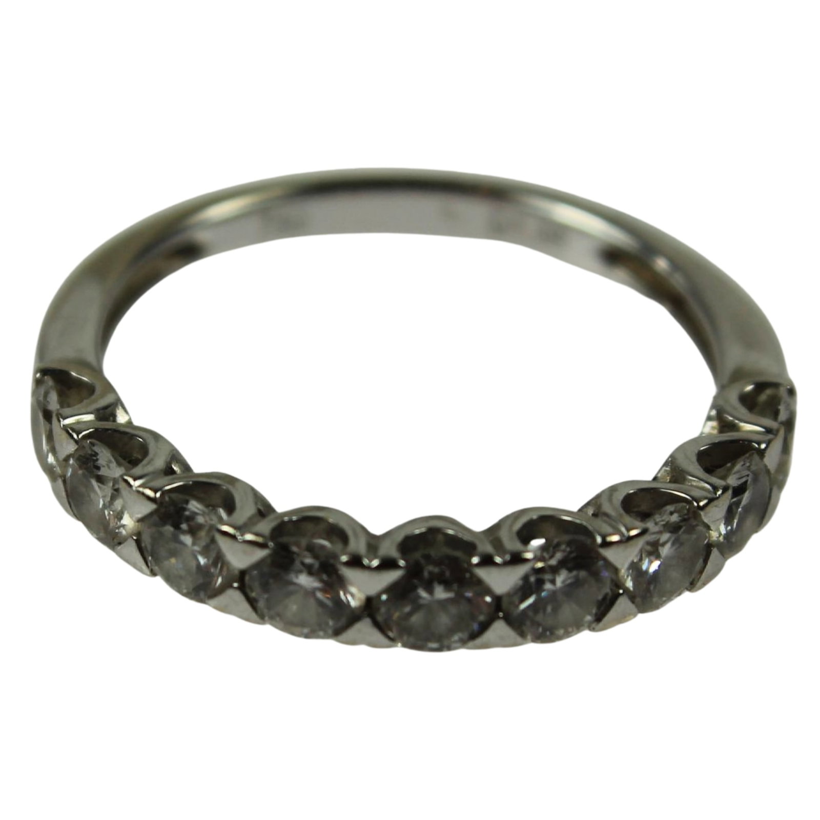 Diamond Bridge Ring in 18ct White Gold: Nine high-quality Diamonds totalling approximately a Carat weight Size Size M : Total weight 2.35gms Medium Rings