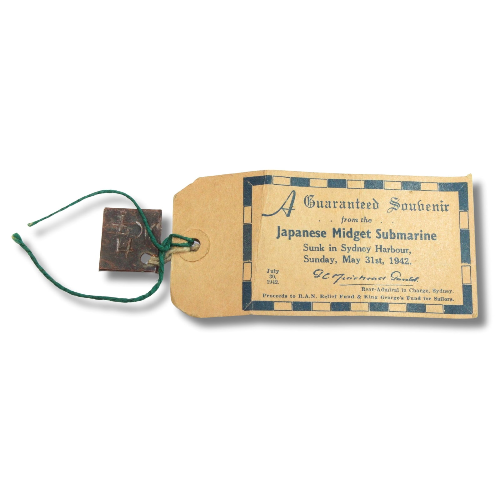 WWII 'Guaranteed Souvenir from Japanese Midget Submarine Sunk in Sydney Harbour, May 31st, 1942,': Comes with original single-sided Blue Label attached for the 'RAN RELIEF FUND & KING GEORGE'S FUND FOR SAILORS, July 30, 1942' Size Measures 2.8x2.6cms Medium Military & Wartime Exhibited World War II
