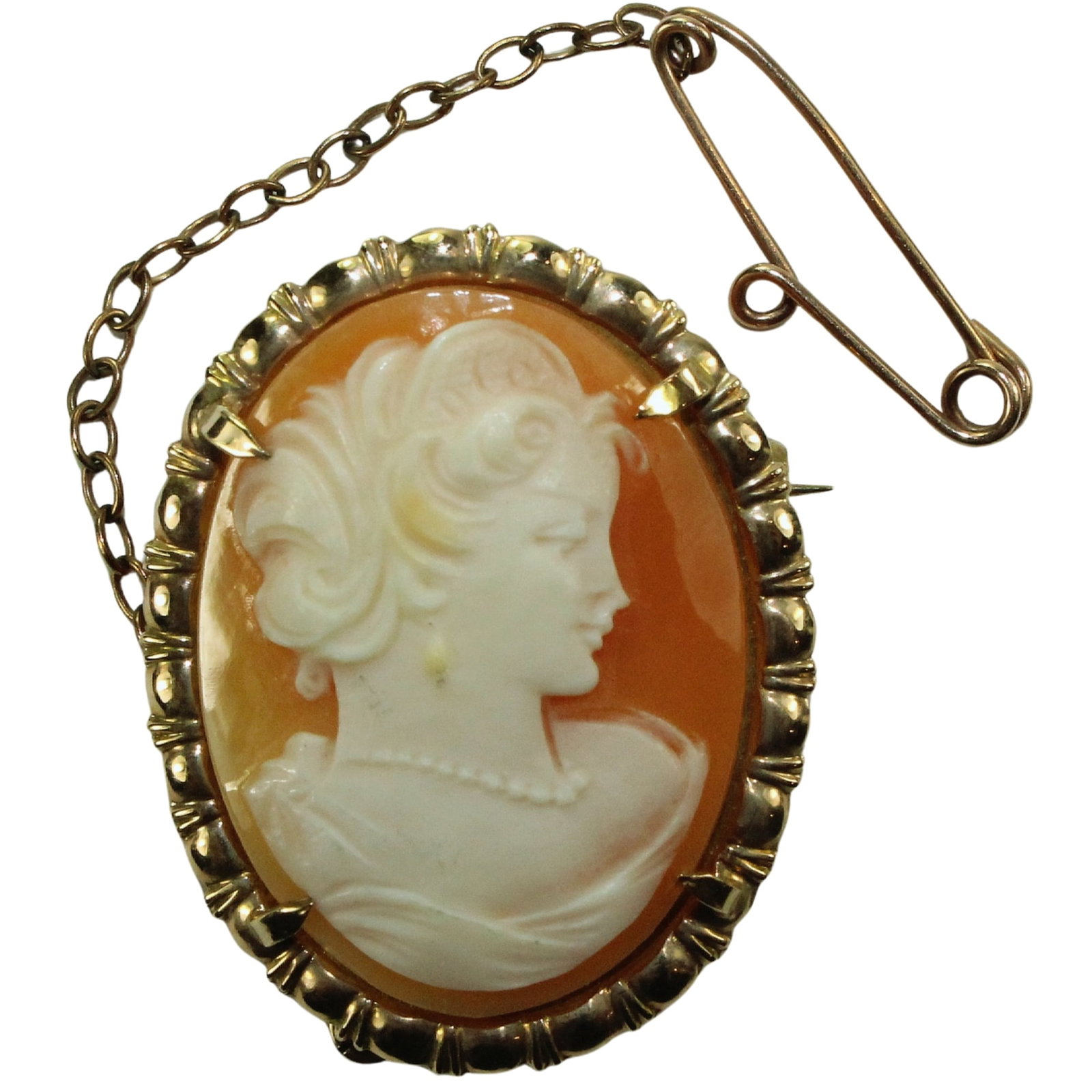 Antique Shell Cameo Brooch in 9ct Gold Surround: Quality Size Dimensions 31x23mm : Total weight 4.77gms Medium Pins & Brooches