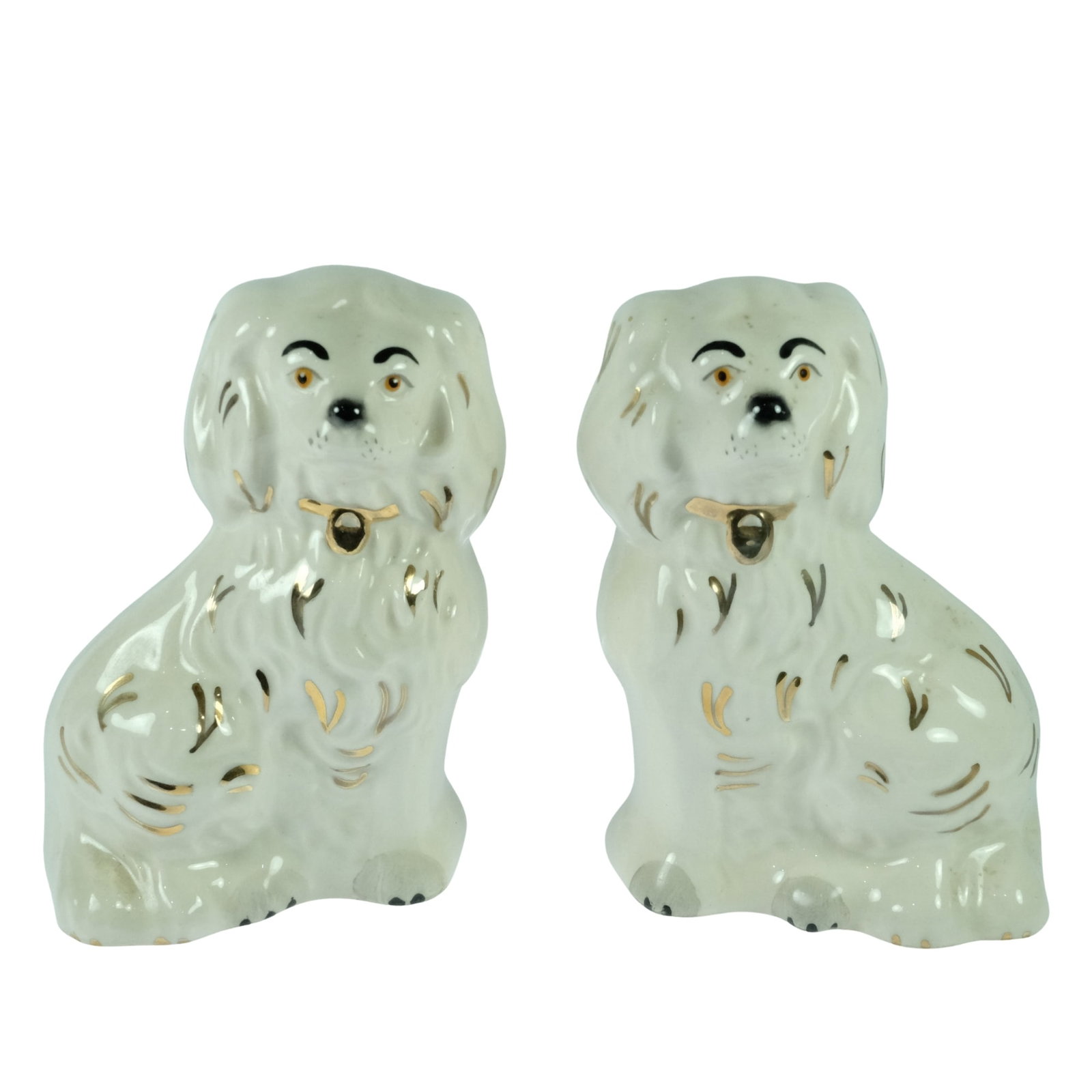 Royal Doulton Porcelain Figurines of Cavalier Dogs (Pair): Numbered 104 & 154 with Gold highlights individually applied Size Each stand 8cm