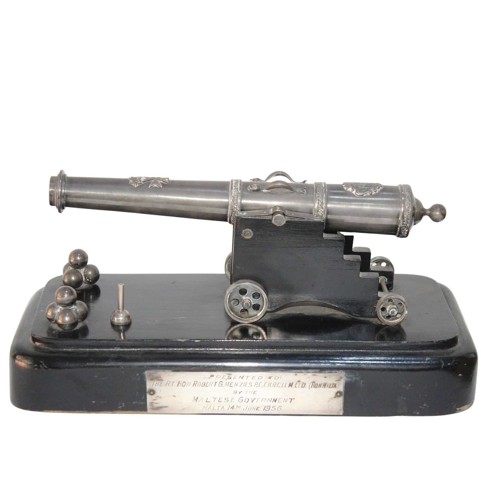 Miniature Naval Cannon in Silver presented to the Australian Prime Minister Sir Robert Menzies: The plaque reads : 'Presented to RT. HON. ROBERT G. Menzies P.C, CH, Q.C, LL.M, LL.D (HON MALTA) BY THE MALTESE GOVERNMENT MALTA 14TH JUNE 1956' Menzies was presented with the cannon whilst he was