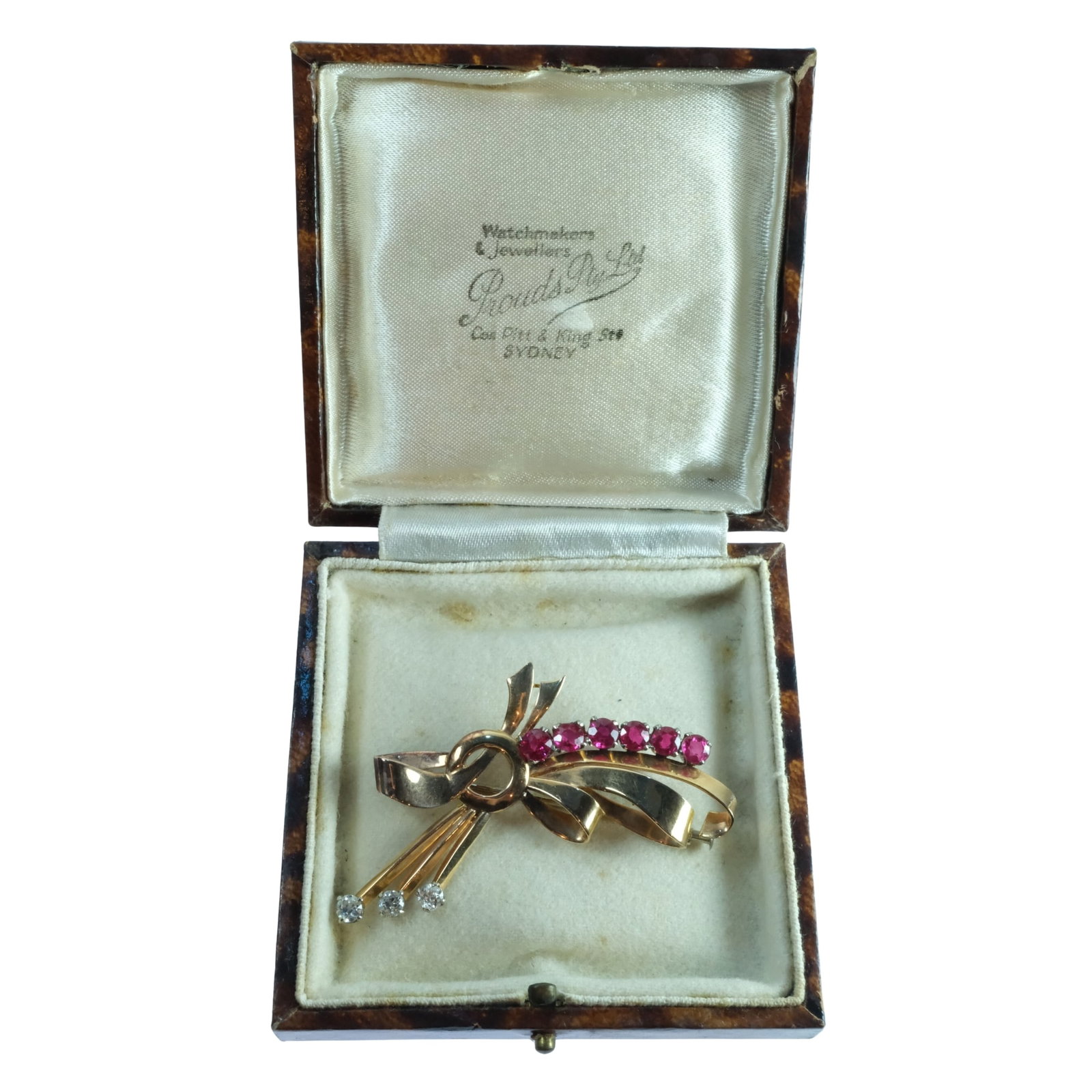 Elegant Bow Brooch with Rubies and Diamonds in 18ct Yellow Gold: Comes in Prouds (Sydney) Box Size Total weight 7.70 grams : Length 6cm Medium Men's Jewelry Exhibited Cufflinks