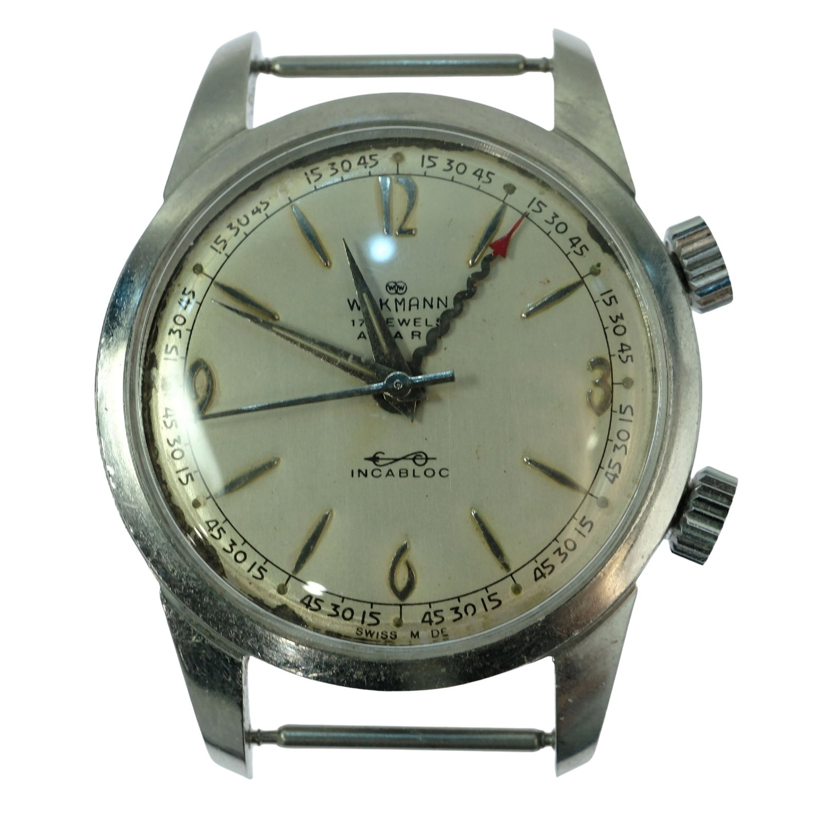 Vintage Men's Wakmann 'Alarm' Wristwatch with Silver Case & Dial: 17 Jewels. No Band Size Case approx 35mm Condition Mechanical. Working but needs service as hands don't line up Medium Vintage
