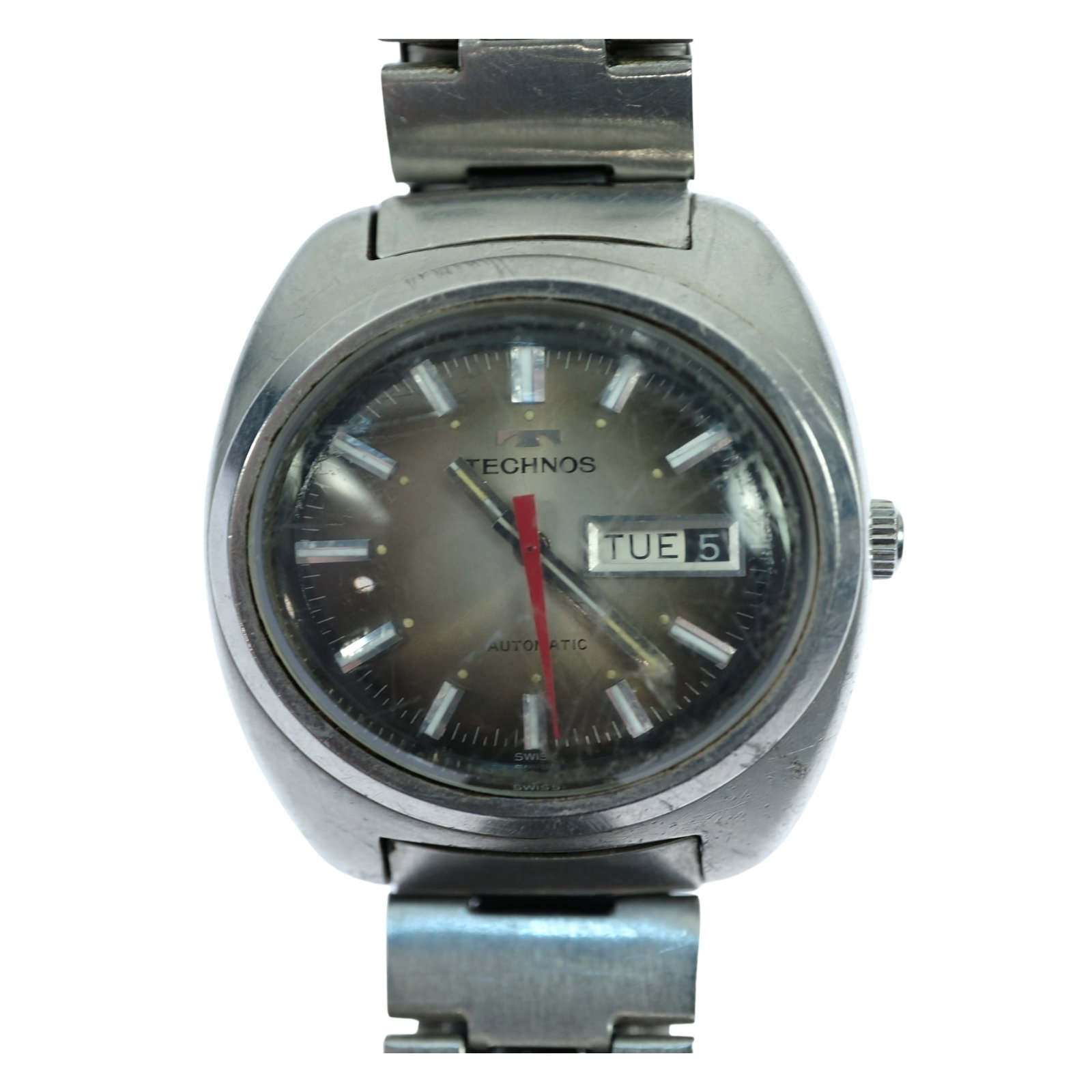 Vintage Men's Technos Wristwatch with Iconic Fading Green Oval Dial: Model# 10343. Day & Date Function Metal Bracelet Size Case approx 40x40mm Condition Automatic. Working Medium Vintage