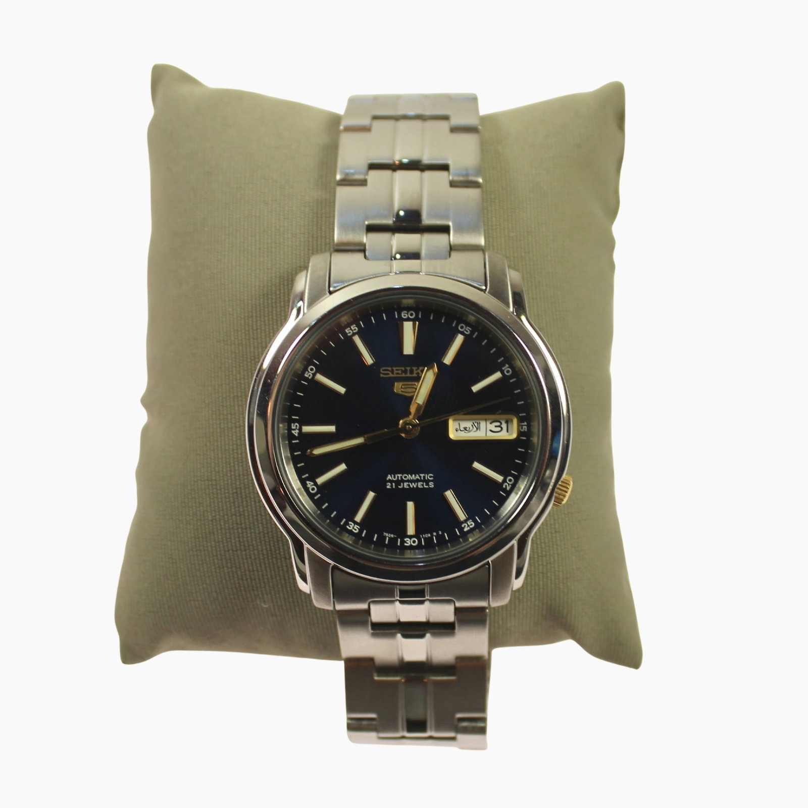 Modern Men's Seiko Dress Wristwatch with Silver Case & Blue Dial - NEW IN BOX: Model# SNKL79K1. Day & Date Calendar Function in Arabic. Glass Back showing exposed movement. Factory Metal Bracelet Size Case approx 38mm Condition Automatic Working Medium Vintage