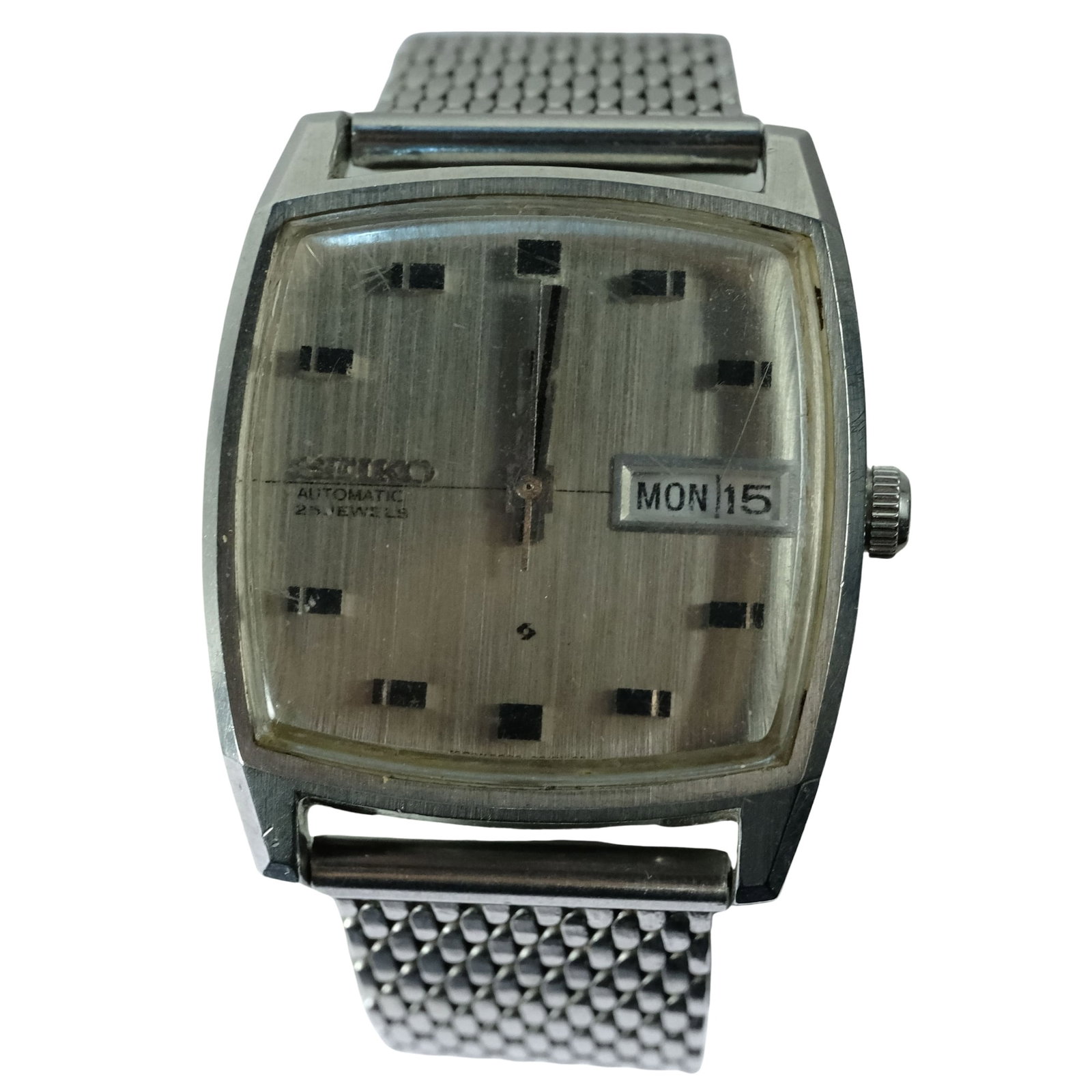 Vintage Men's Seiko 'Lord Matic' Square Wristwatch with Silver Case & Dial: Model# 5606 - 5000 with Rare Side Branding. Day & Date Function. Metal mesh Bracelet Size Case approx 30x30mm Condition Automatic. Working Medium Vintage