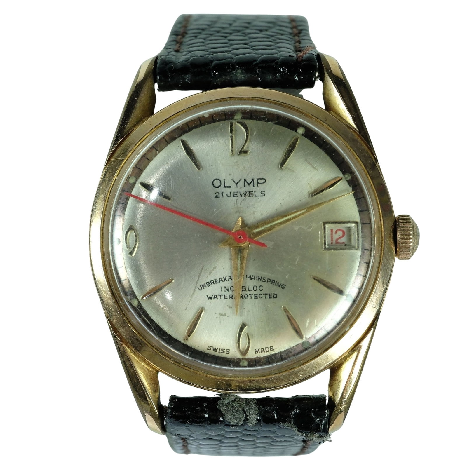 Vintage Men's Olymp(ic) Wristwatch with Gold Case & Silver Dial: Model# 2010. Date Function. New Leather Band. The 'Olymp' Brand was registered in 1953 by the Sydney watch importer Charles Spring. Spring imported generic catalogue watches sourced from Switzerland,