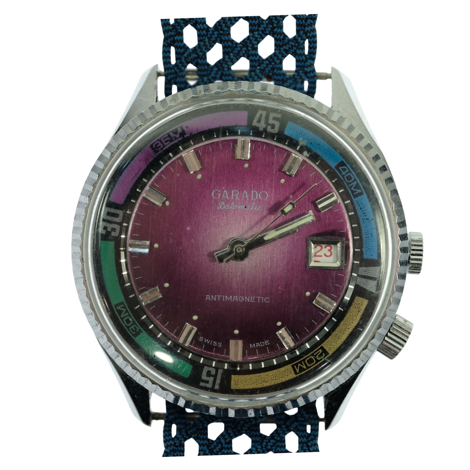Vintage Men's Garado 'Datomatic' Diver Wristwatch with Multi-coloured Dial: Funky Eulit Blue Macrame Band with Gold Buckle. LGBTQIA+ friendly. Size Case approx 40mm Condition Works intermittently & requires service Medium Vintage