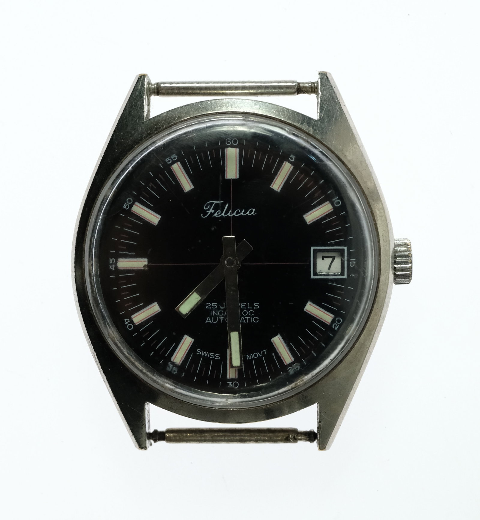 Vintage Men's Felicia Wristwatch with Silver Case & Black Dial: 25 Jewels. Date Function. No Band Size Case approx 33mm Condition Automatic. Working Medium Vintage
