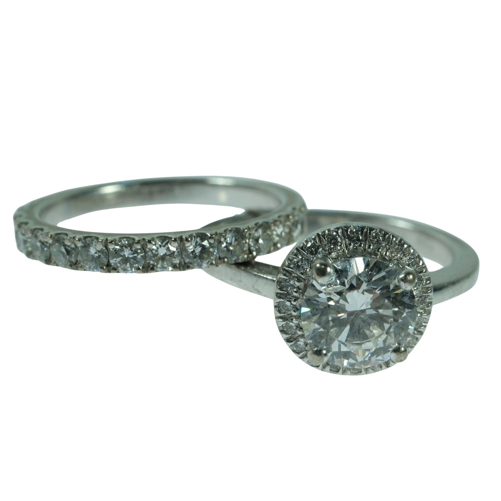 Bespoke One Carat Wedding Ring with Matching Wedding Band in 18ct White Gold: Made by Cerrone Jewellers (Sydney) and comes with 2015 Valuations of $23,150 (Ring) & $2,200 (Band). The major Stone is 1.01 Carat Round Brilliant Cut, Colour D, SI1. The band has 0.52 Carats of