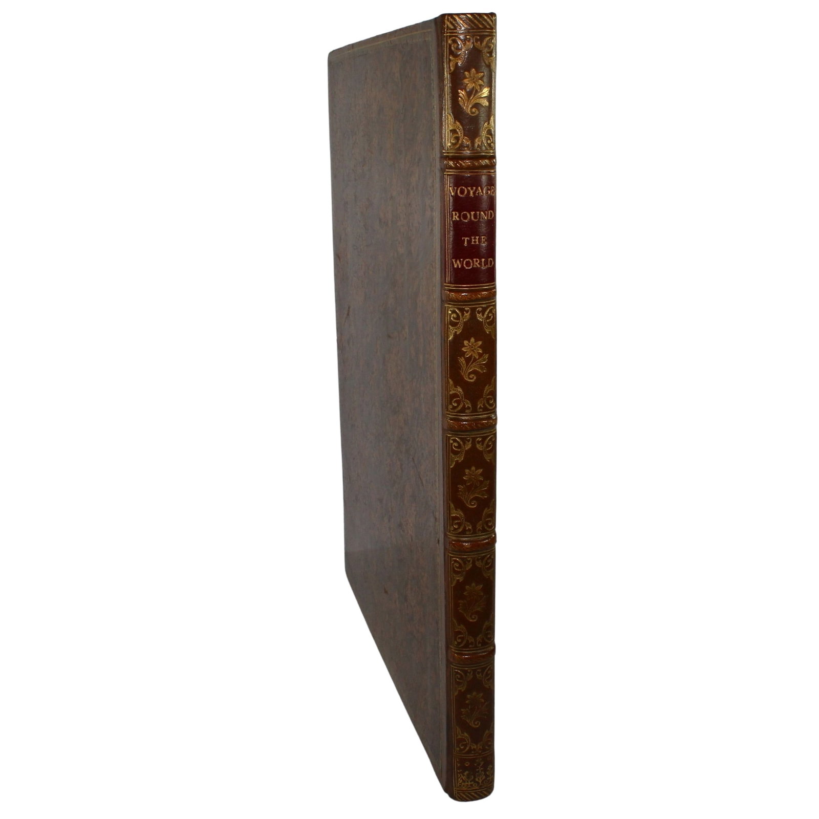 A Voyage Round the World in the Years MDCCLXXII, LXXIII, LXXIV, LXXV by Captain James Cook: An anonymous recount by 'an Officer on Board' published by W Lane, London in 1781. It is a reissued remainder of the 1776 'First Edition' with a new title page tipped in. A similar copy of this unoffi
