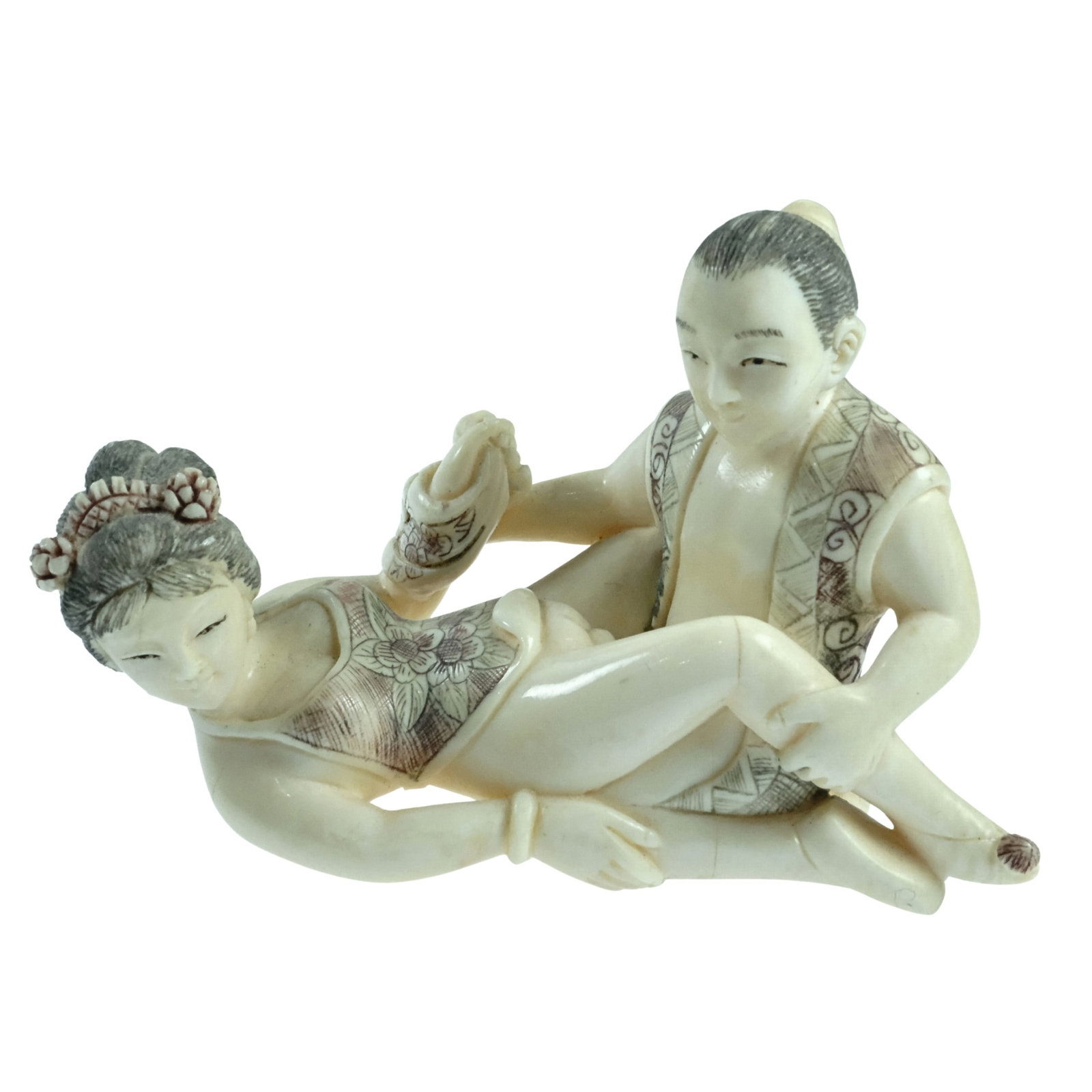 Finely executed Japanese Erotic Ivory Okimono of a Copulating Couple: Signed. Polychromated with Red & Green Inks Size Stands 5cms